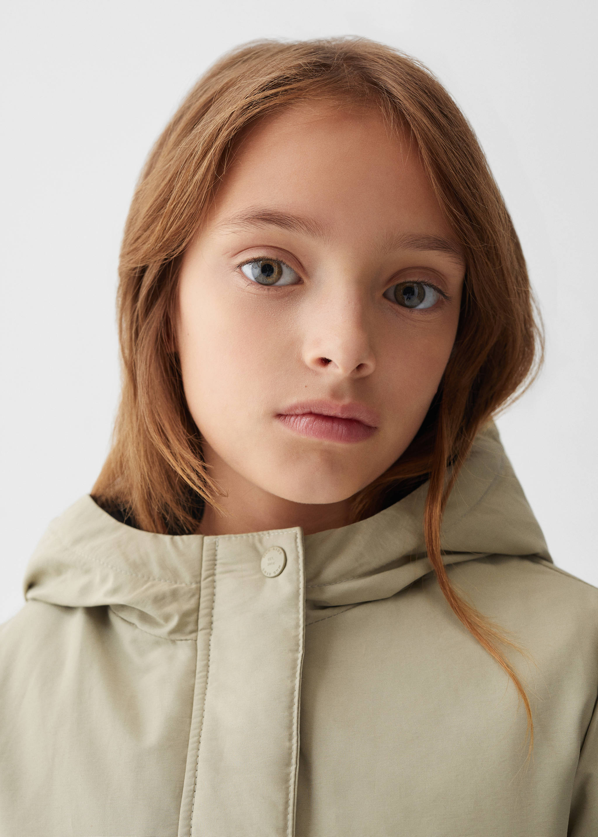 Manteau imperméable à capuche - Détail de l'article 1