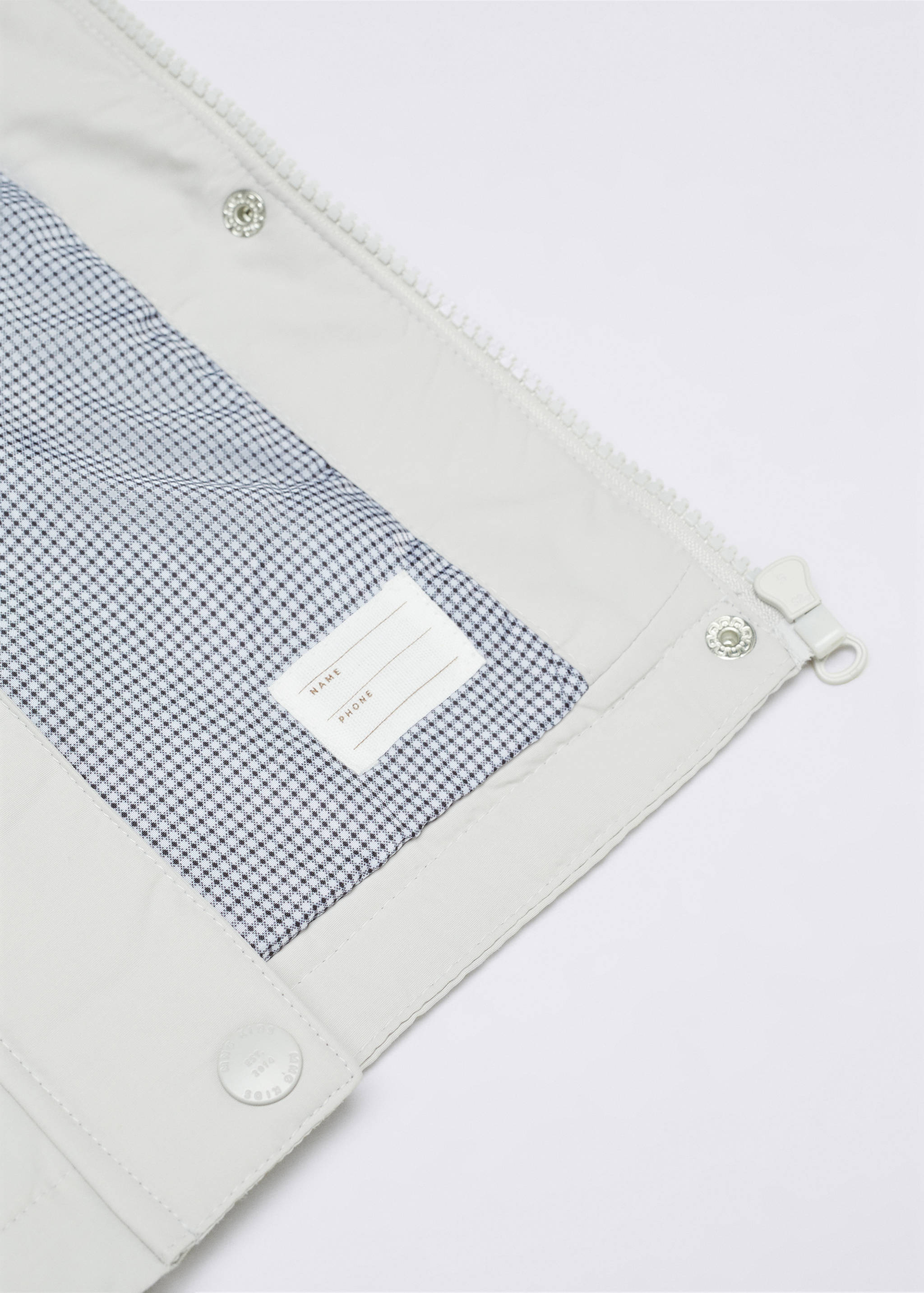 Manteau imperméable à capuche - Détail de l'article 8