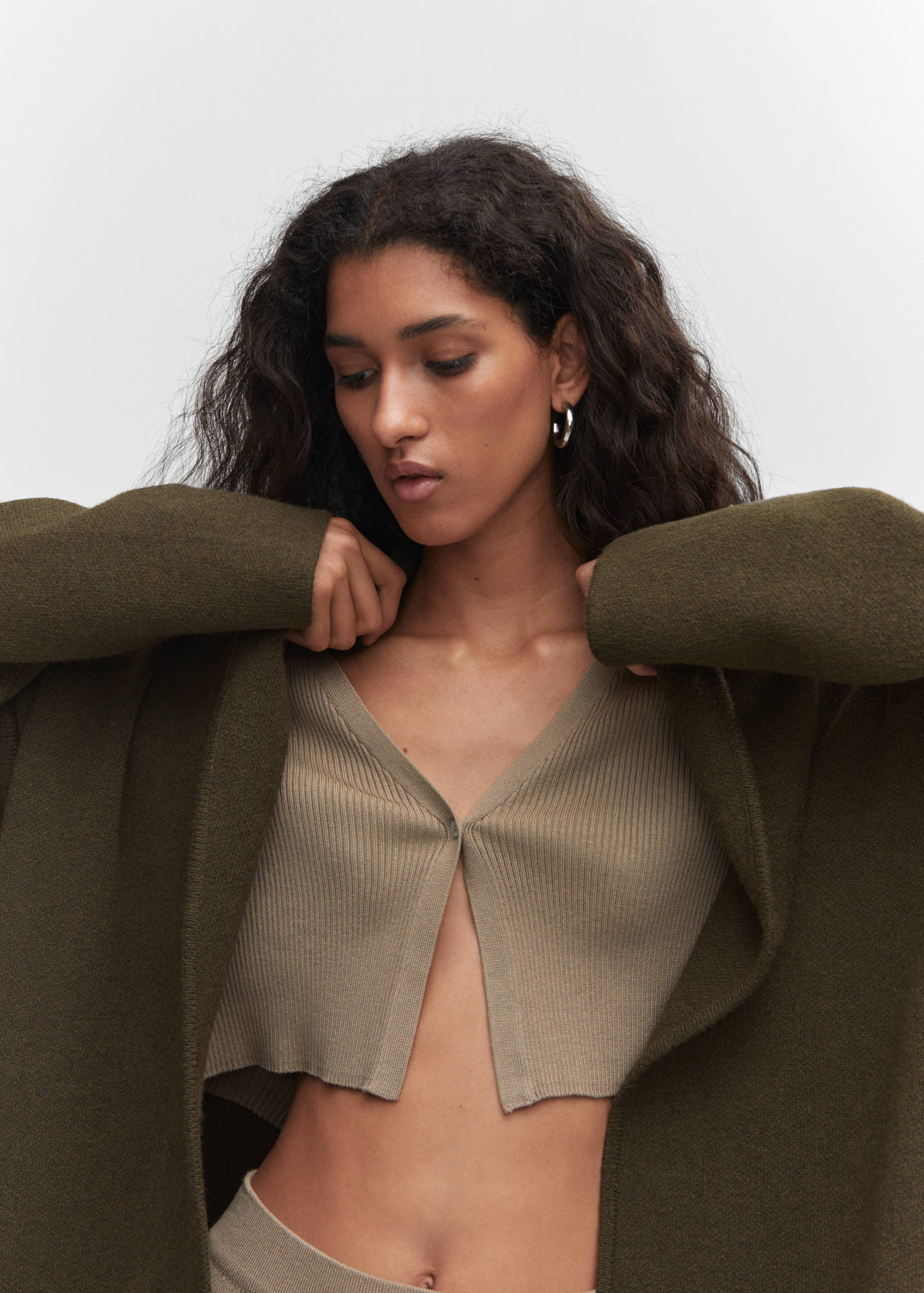 Oversized knitted coat with pockets - Details of the article 1
