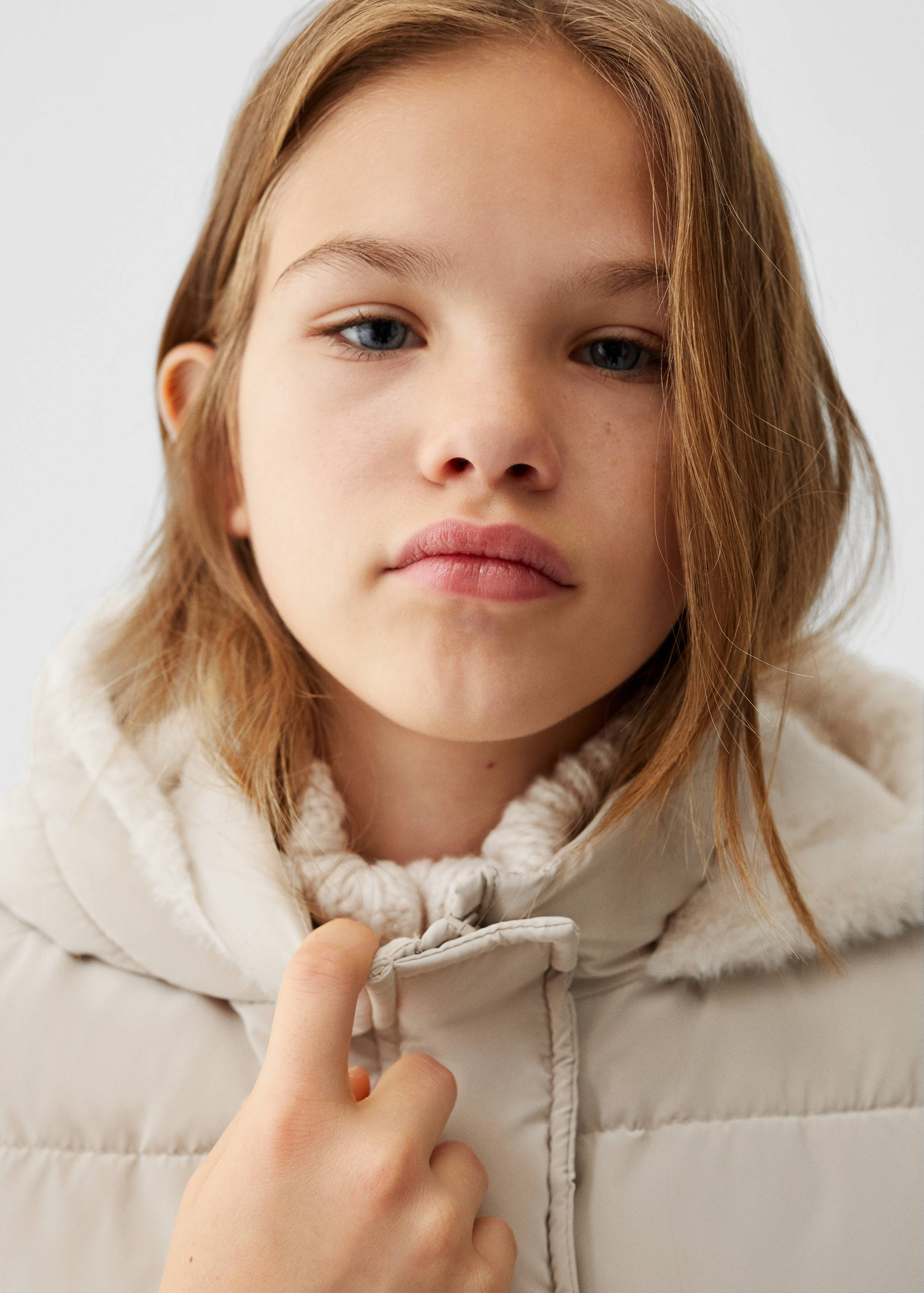 Quilted gilet with fur-effect hood - Details of the article 1