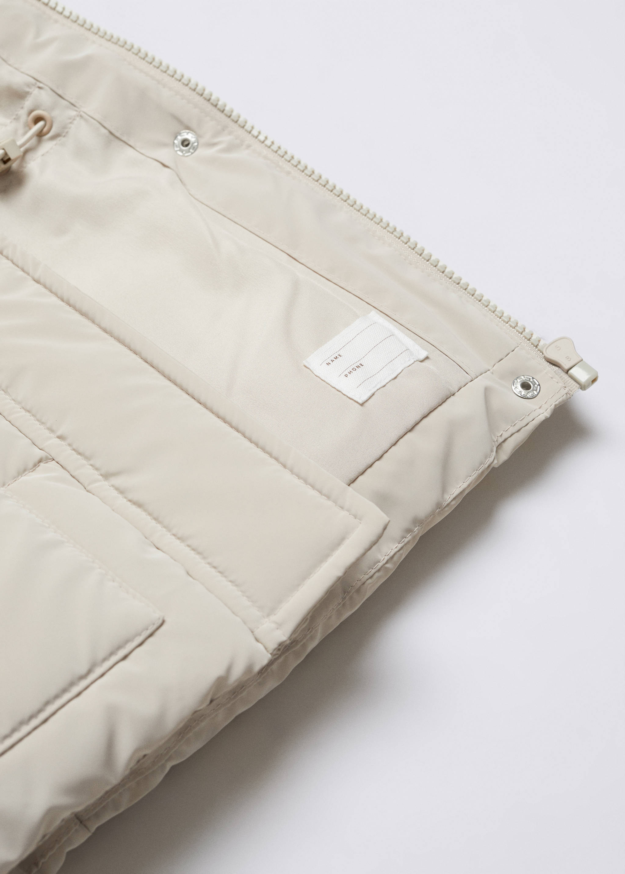 Quilted gilet with fur-effect hood - Details of the article 8