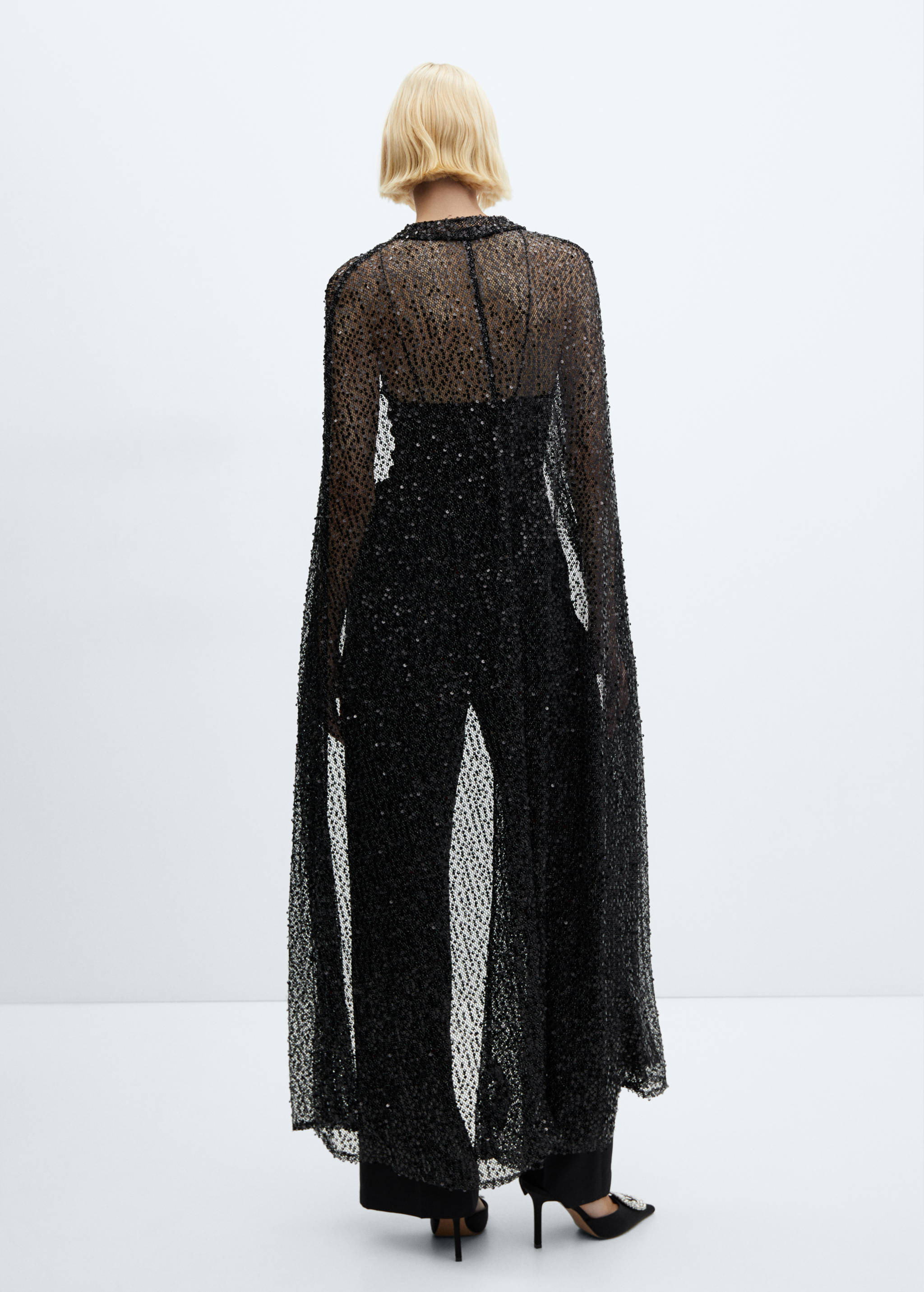 Long sequin cape - Reverse of the article