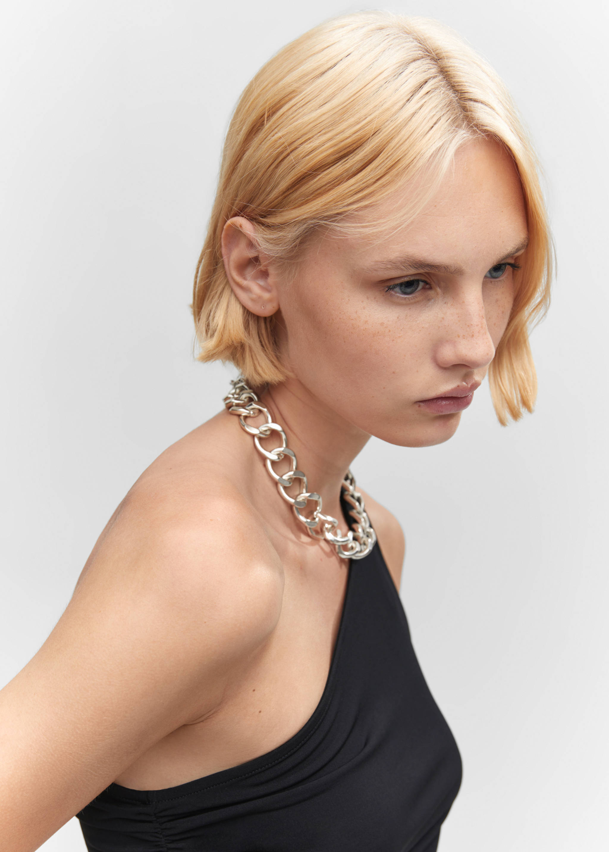 Asymmetrical dress with side slit - Details of the article 1