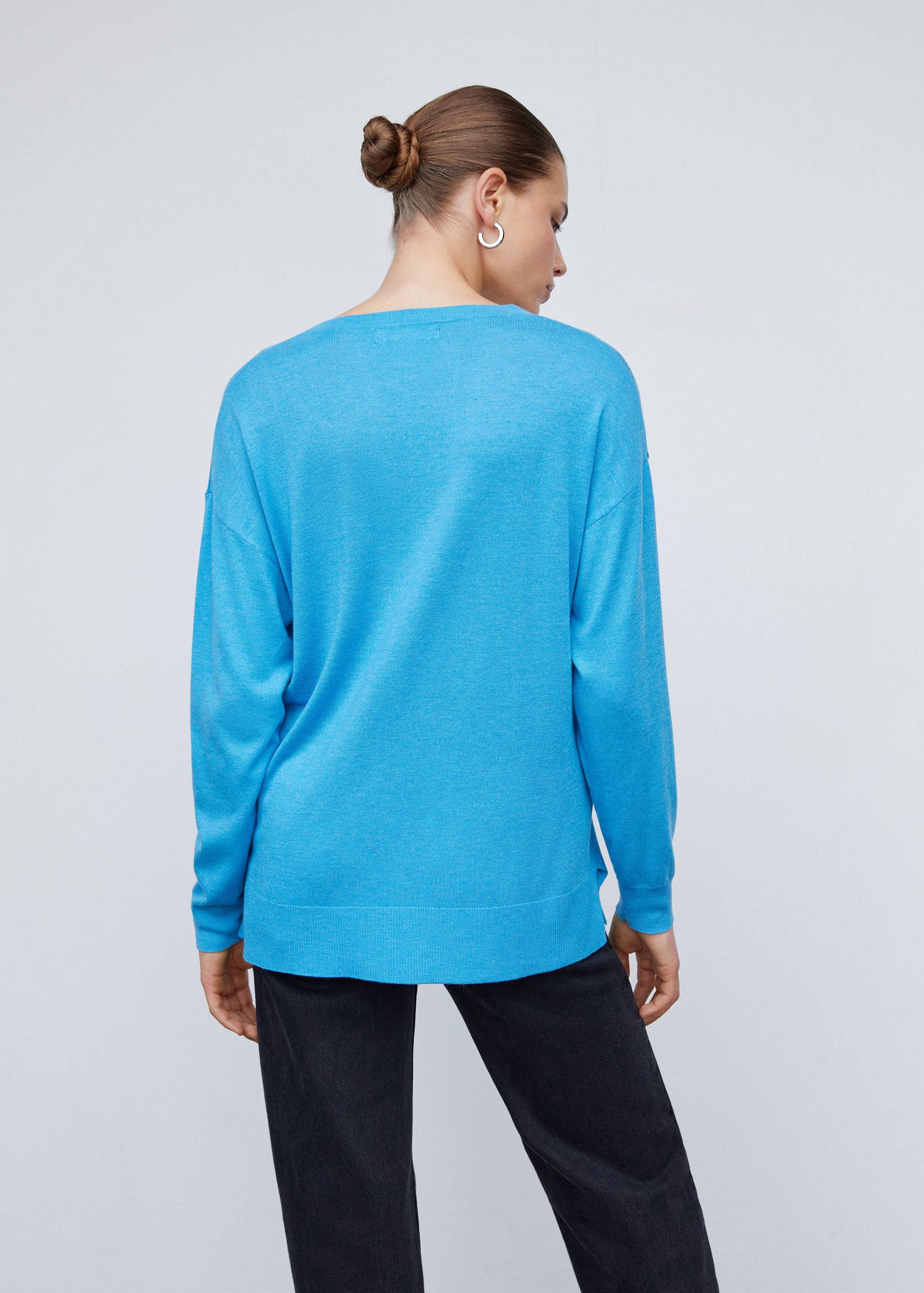 V-neck pullover with slits - Reverse of the article