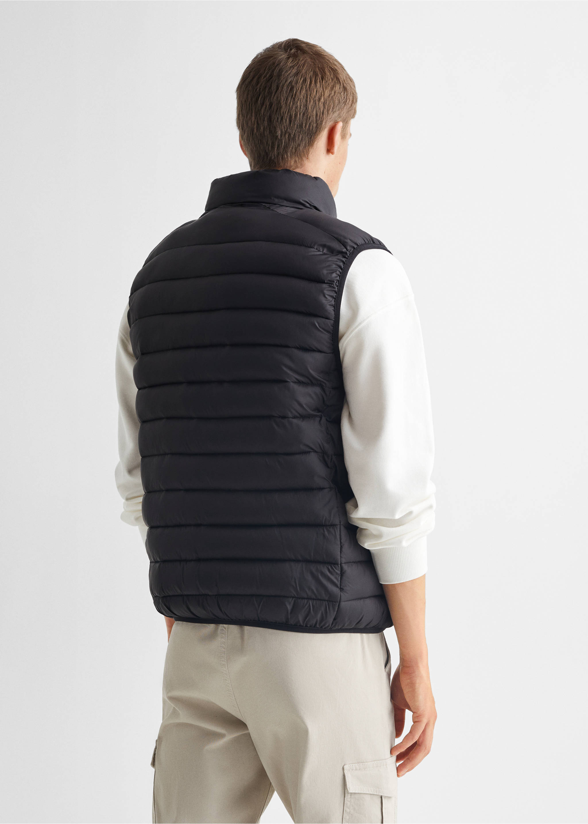 Quilted gilet - Reverse of the article, Black. Ref: 57095132-00.