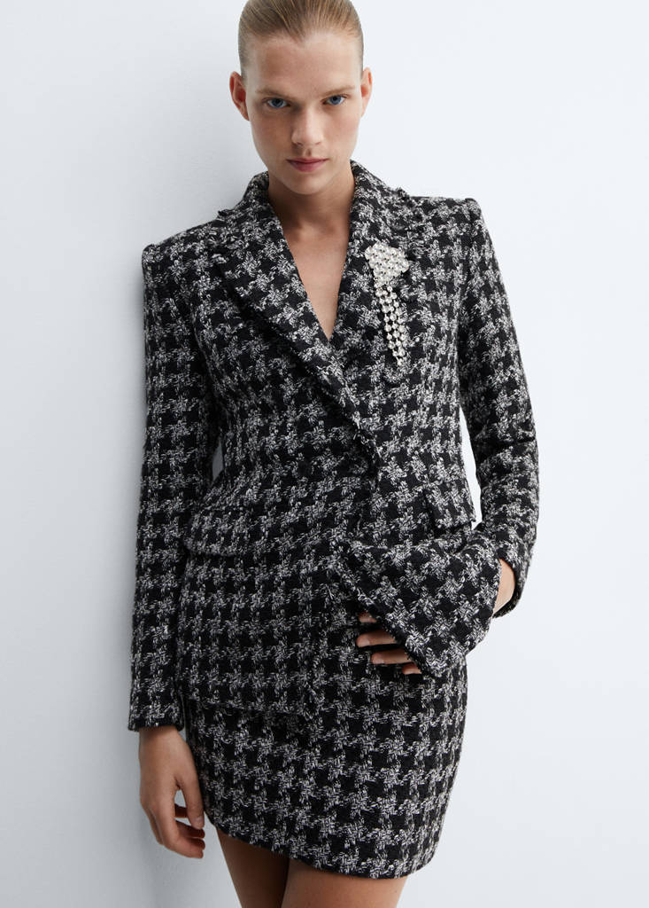 Tweed jacket with brooch