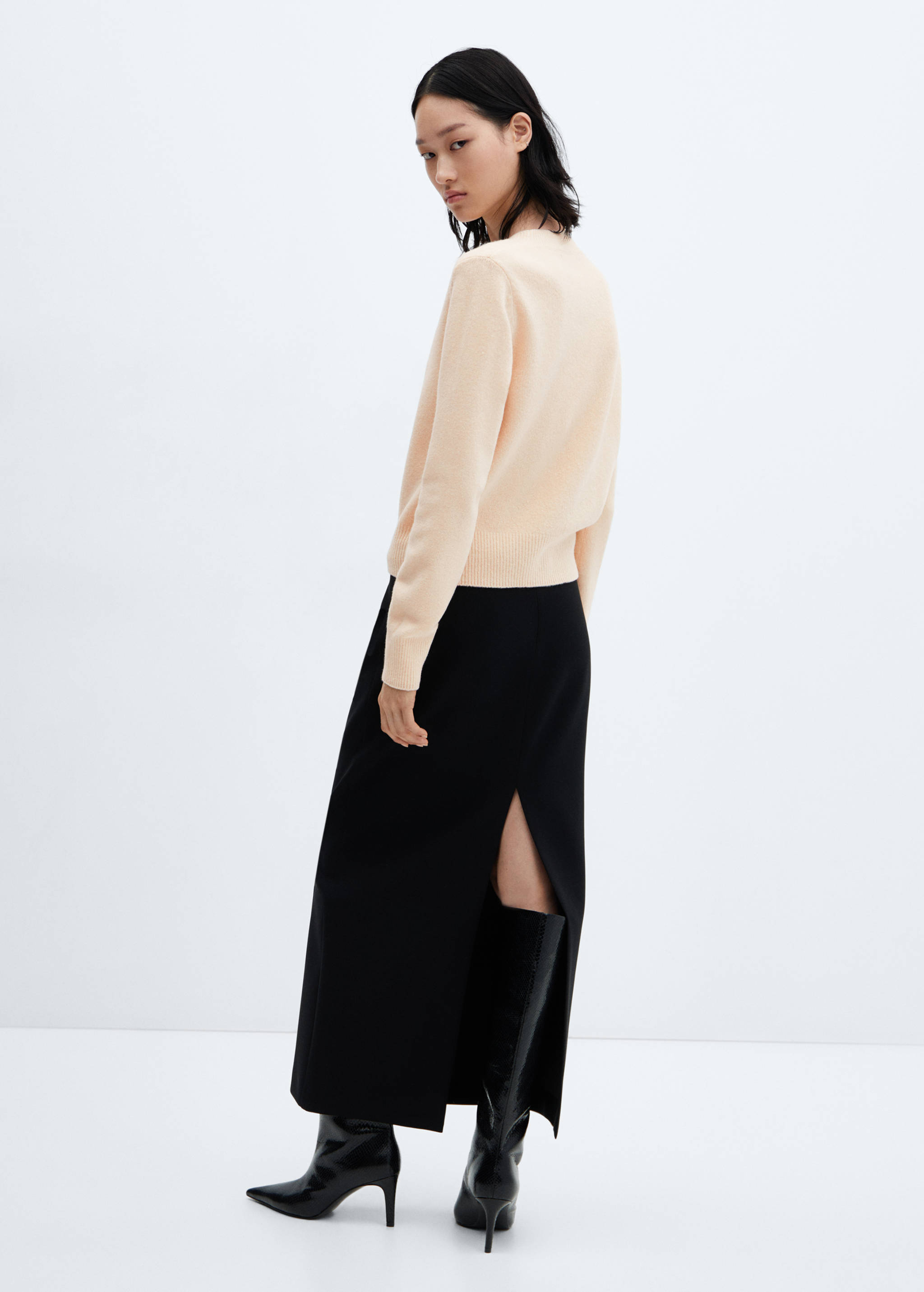 Round-neck knitted sweater - Reverse of the article