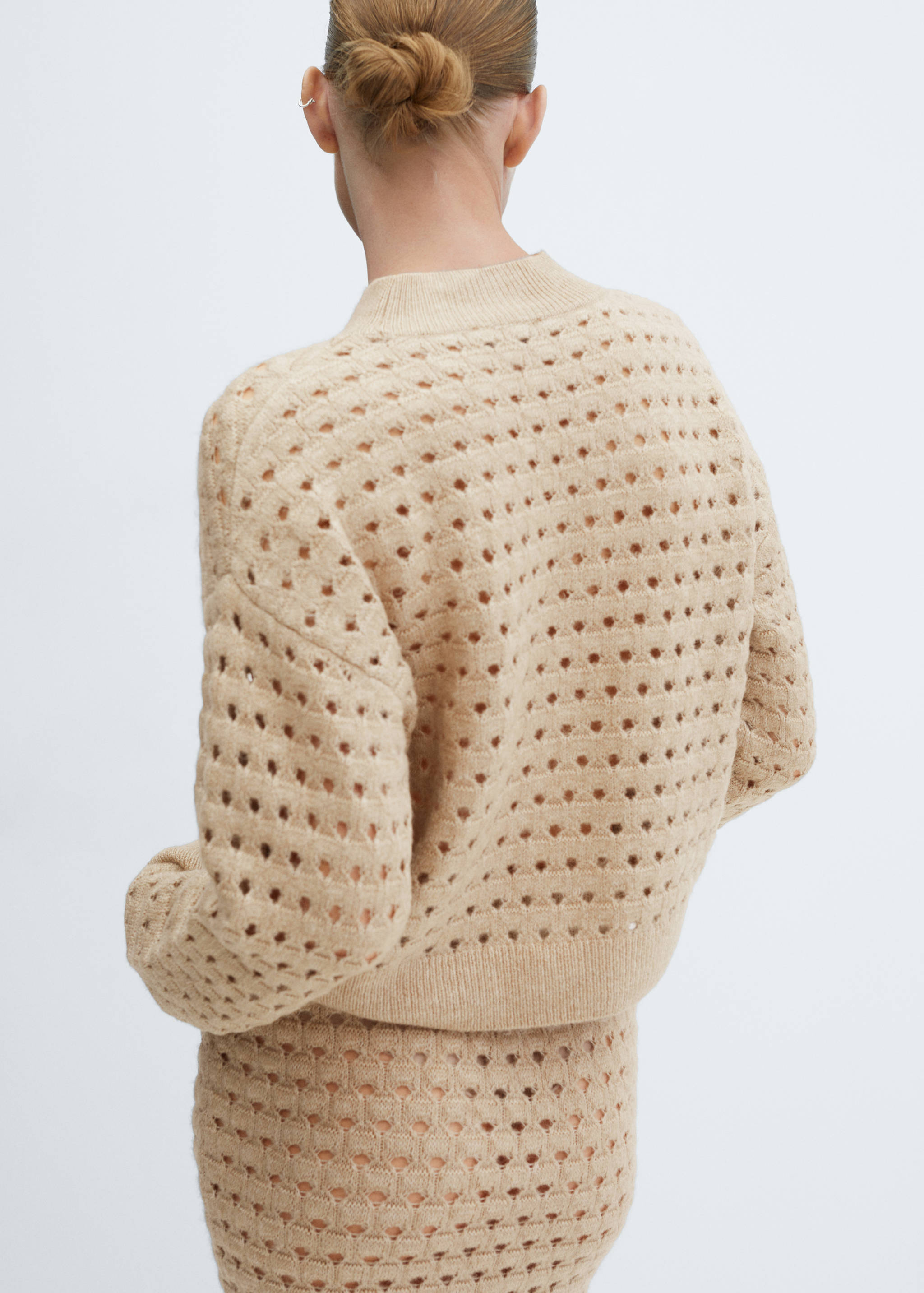 Knitted sweater with openwork details - Reverse of the article