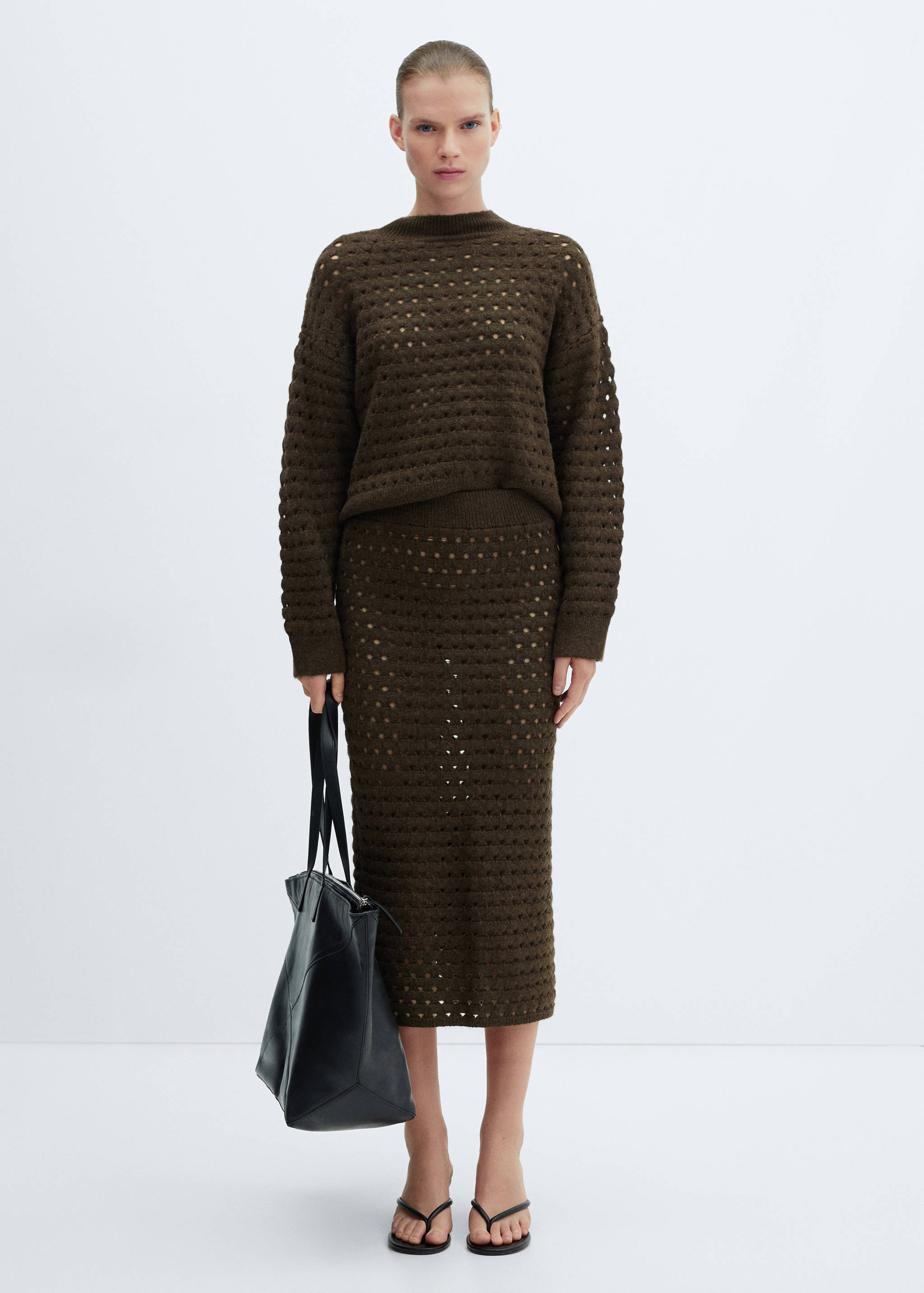 Knitted sweater with openwork details - General plane