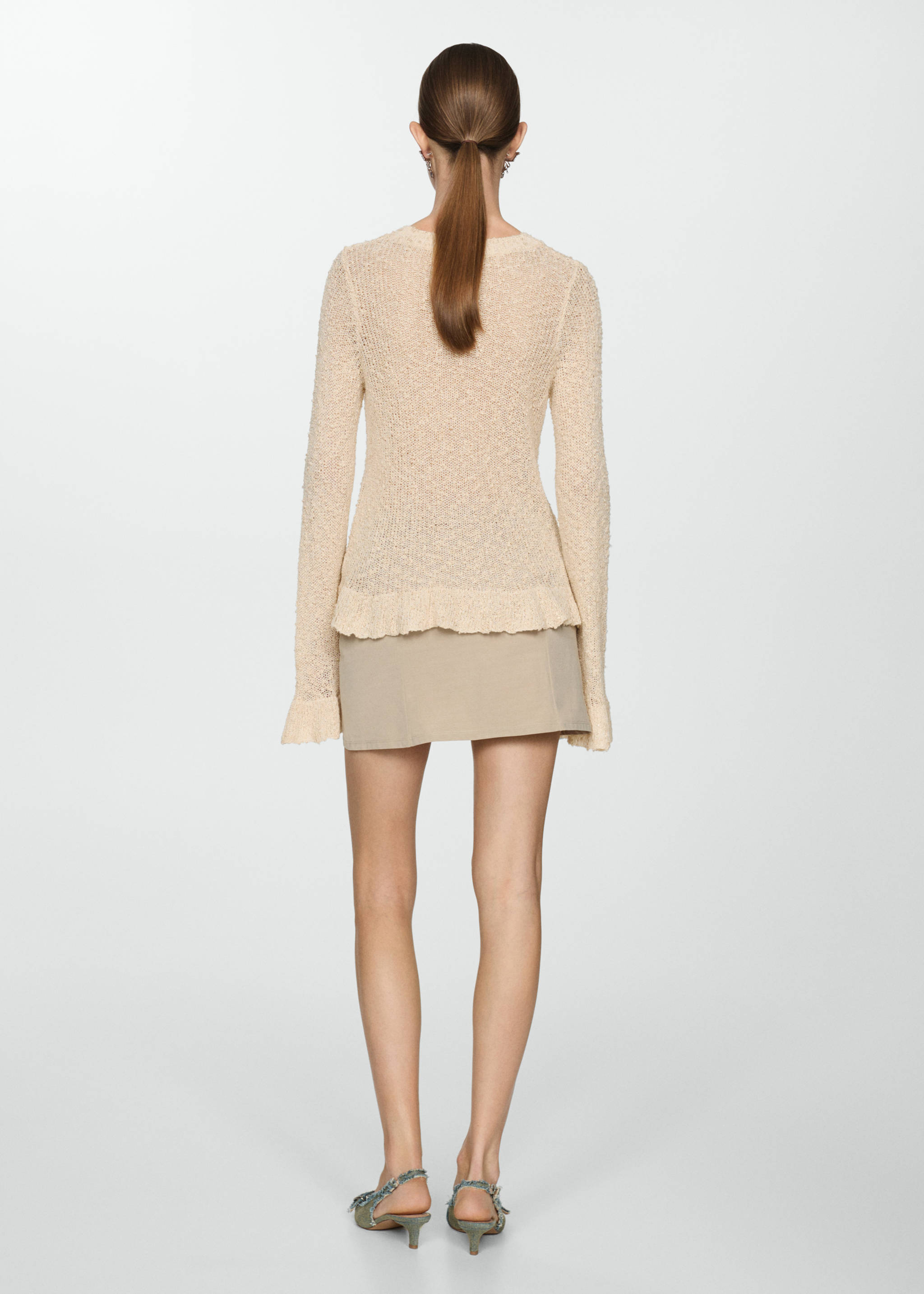 Jersey terminaciones volantes - Reverso del artículo