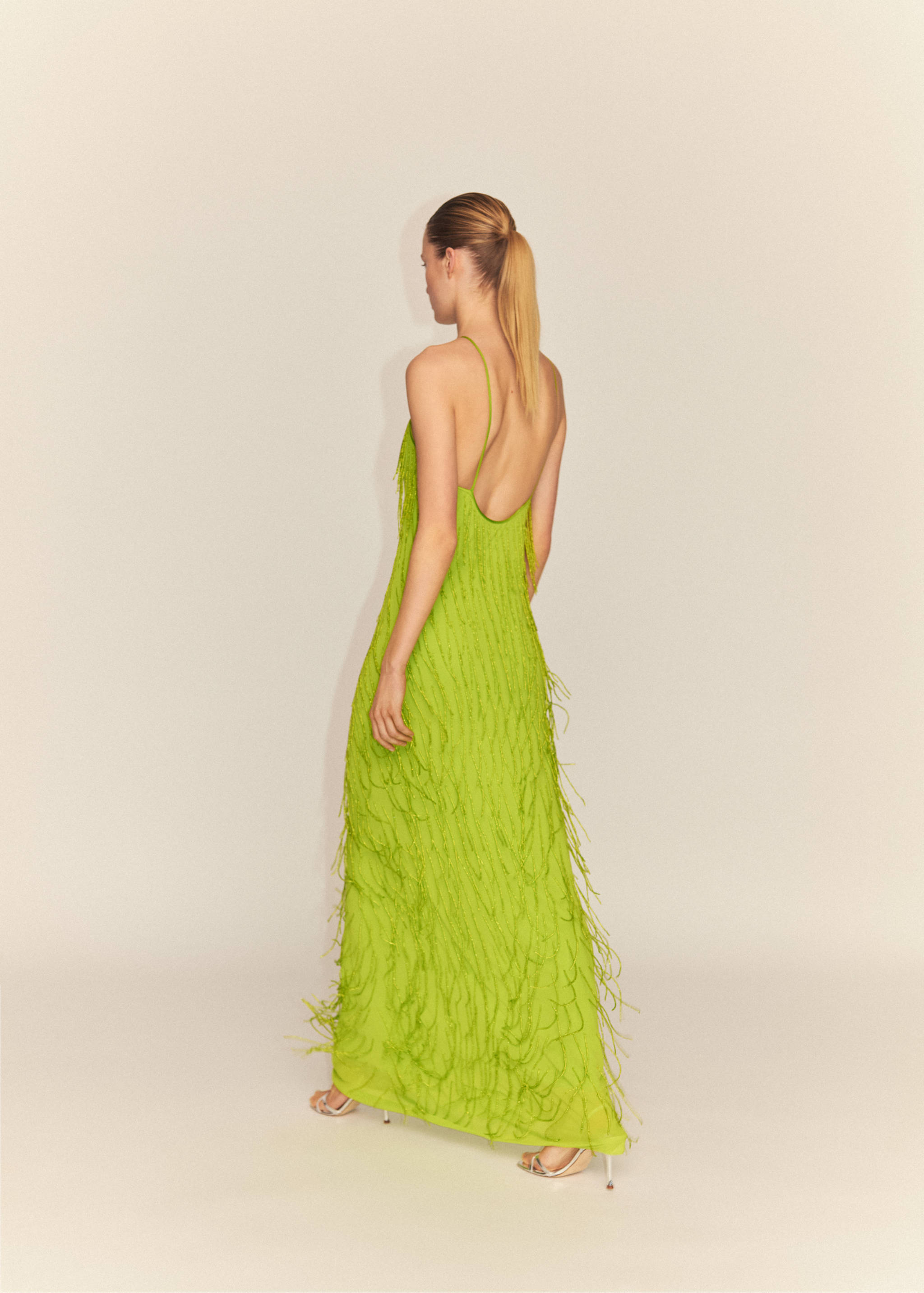 Halter dress with rhinestone fringes - Reverse of the article