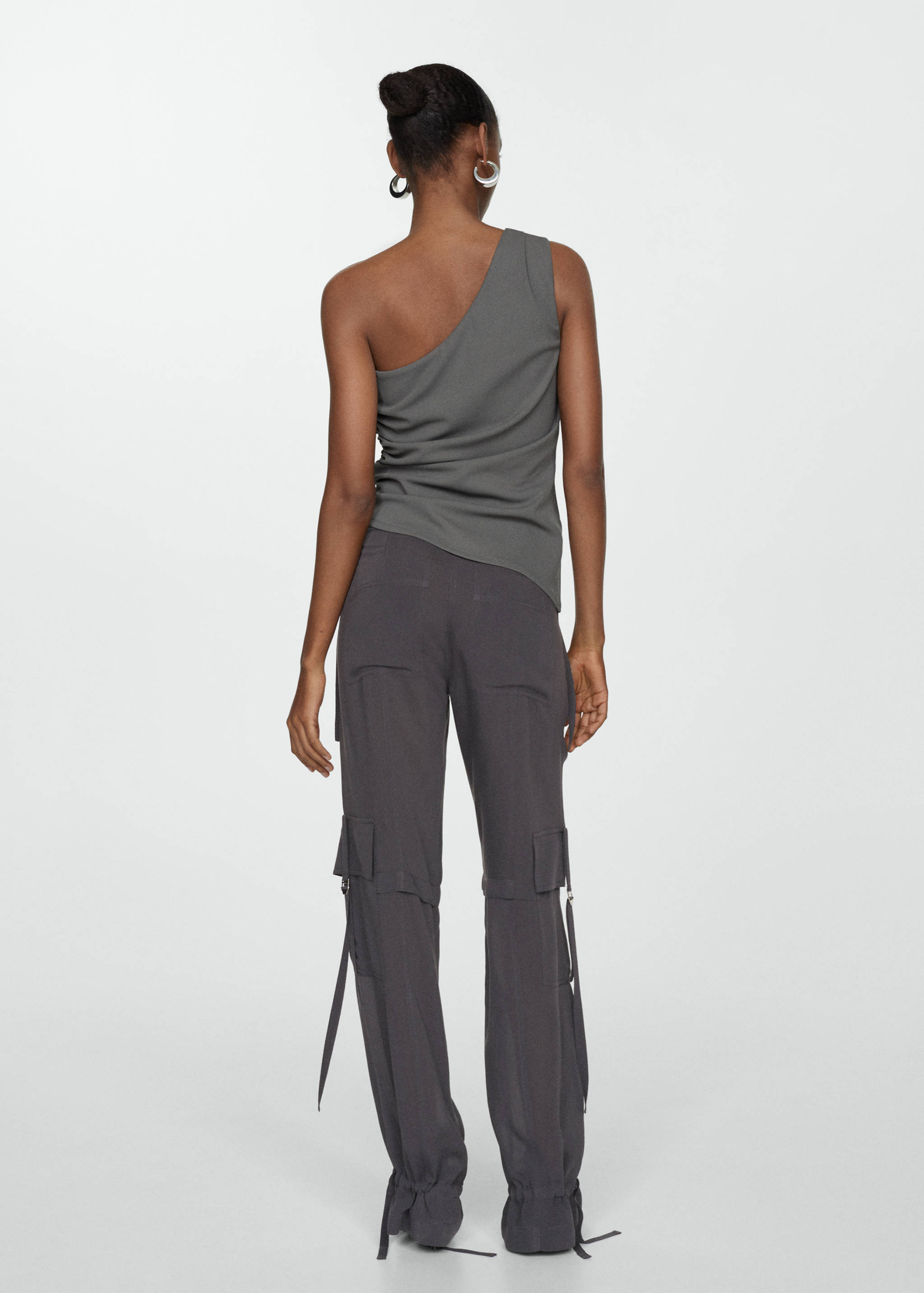 Cargo pants with metallic details - Reverse of the article