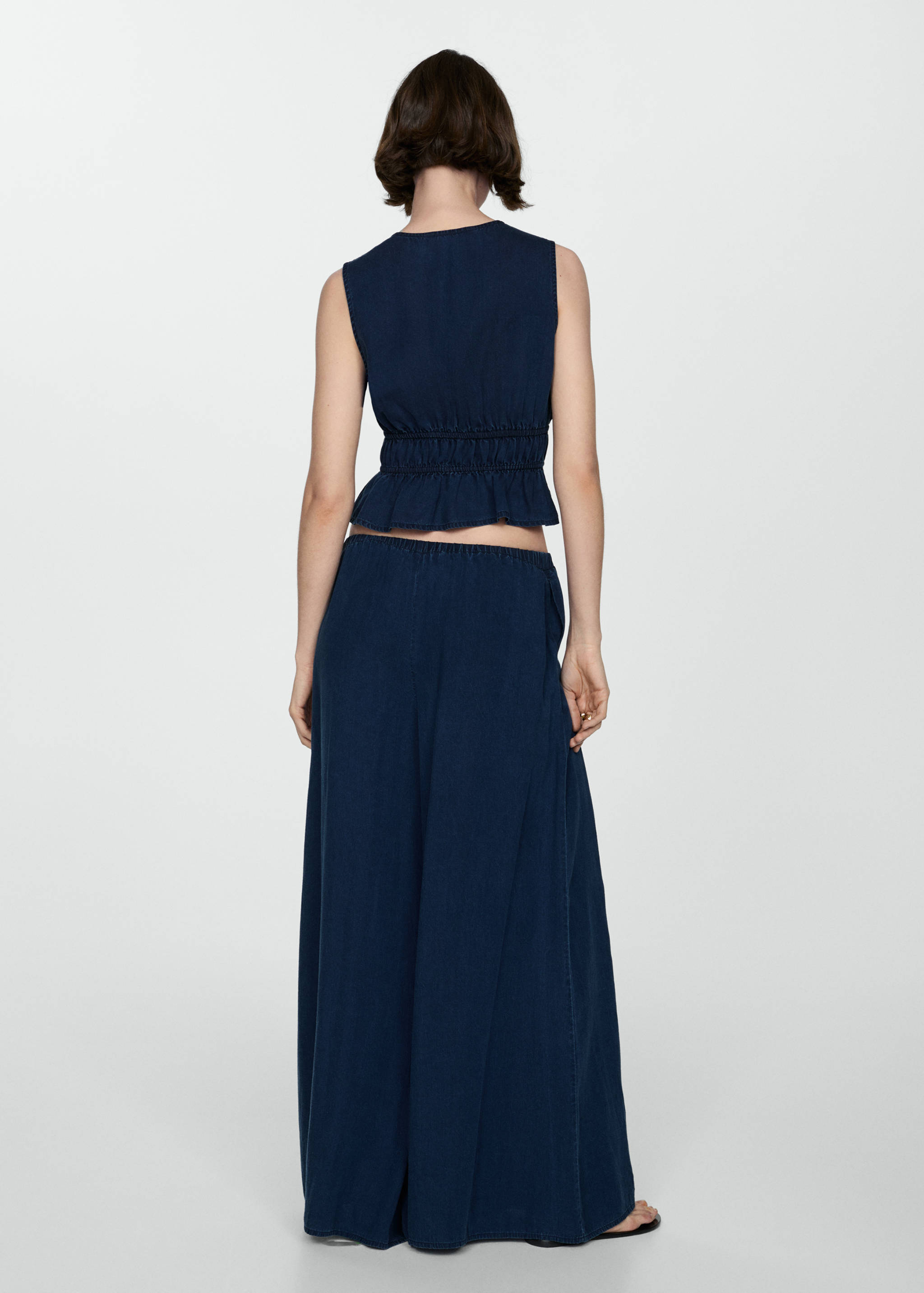 Ruffled top with bows - Reverse of the article