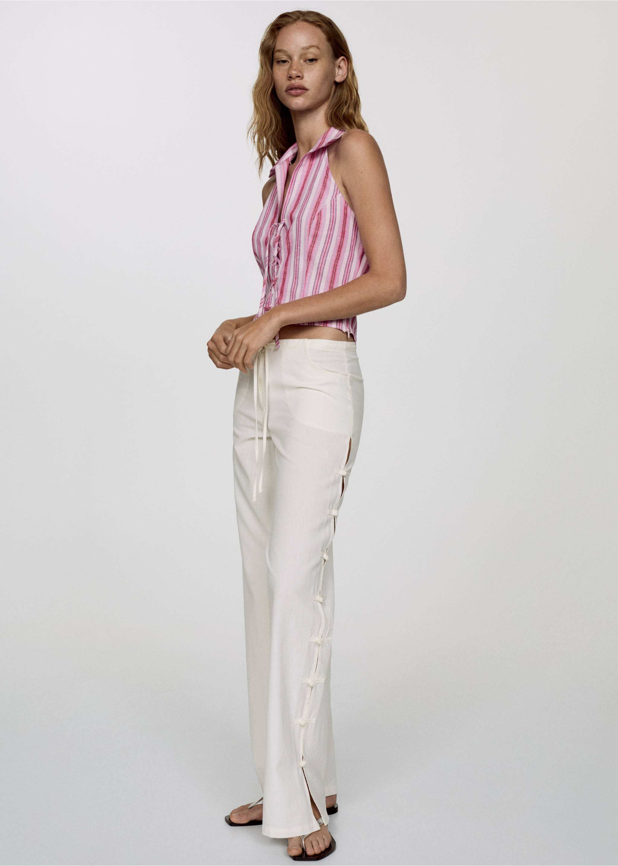 Wide leg trousers with buttons - Details of the article 2, Ecru. Ref: 67019607-00.