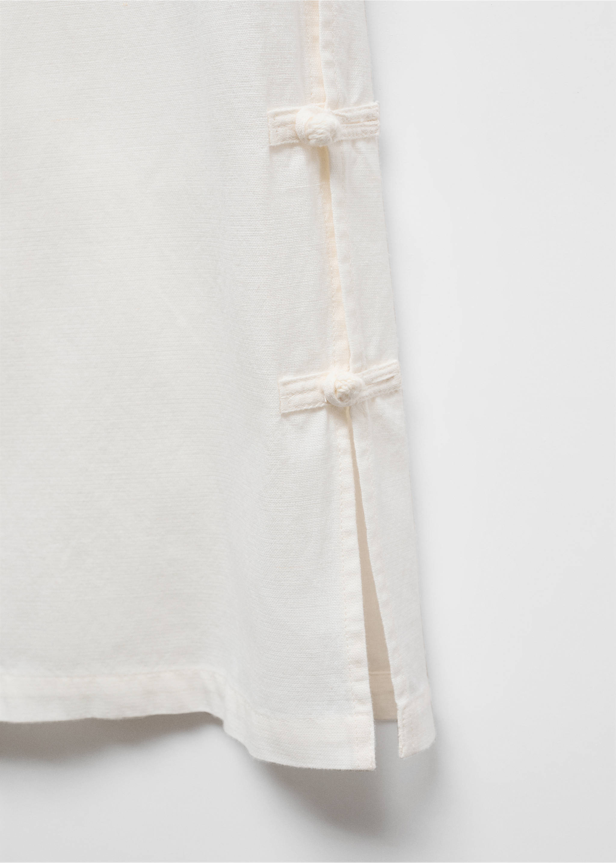 Wide leg trousers with buttons - Details of the article 8, Ecru. Ref: 67019607-00.