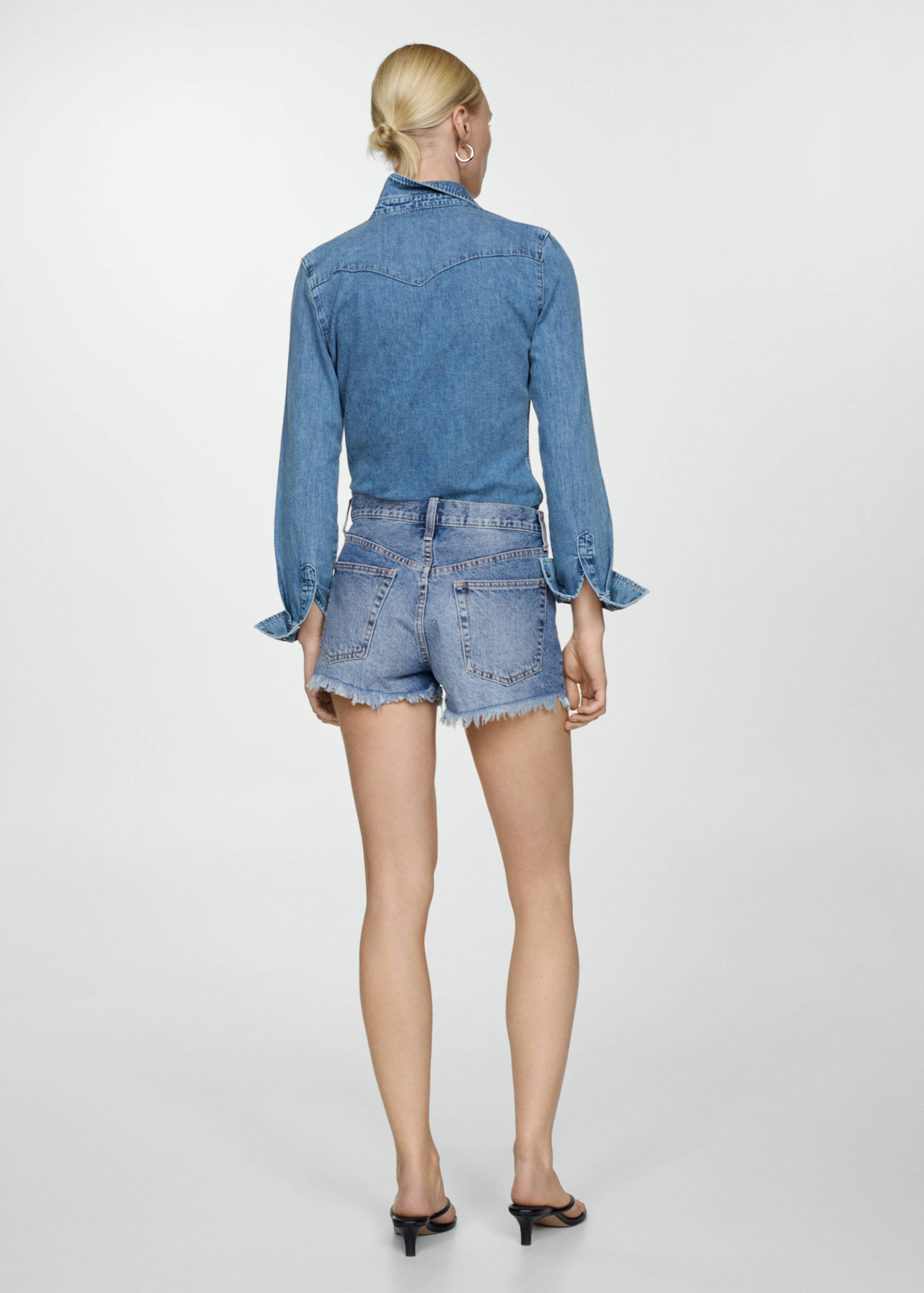 Broken denim shorts - Reverse of the article