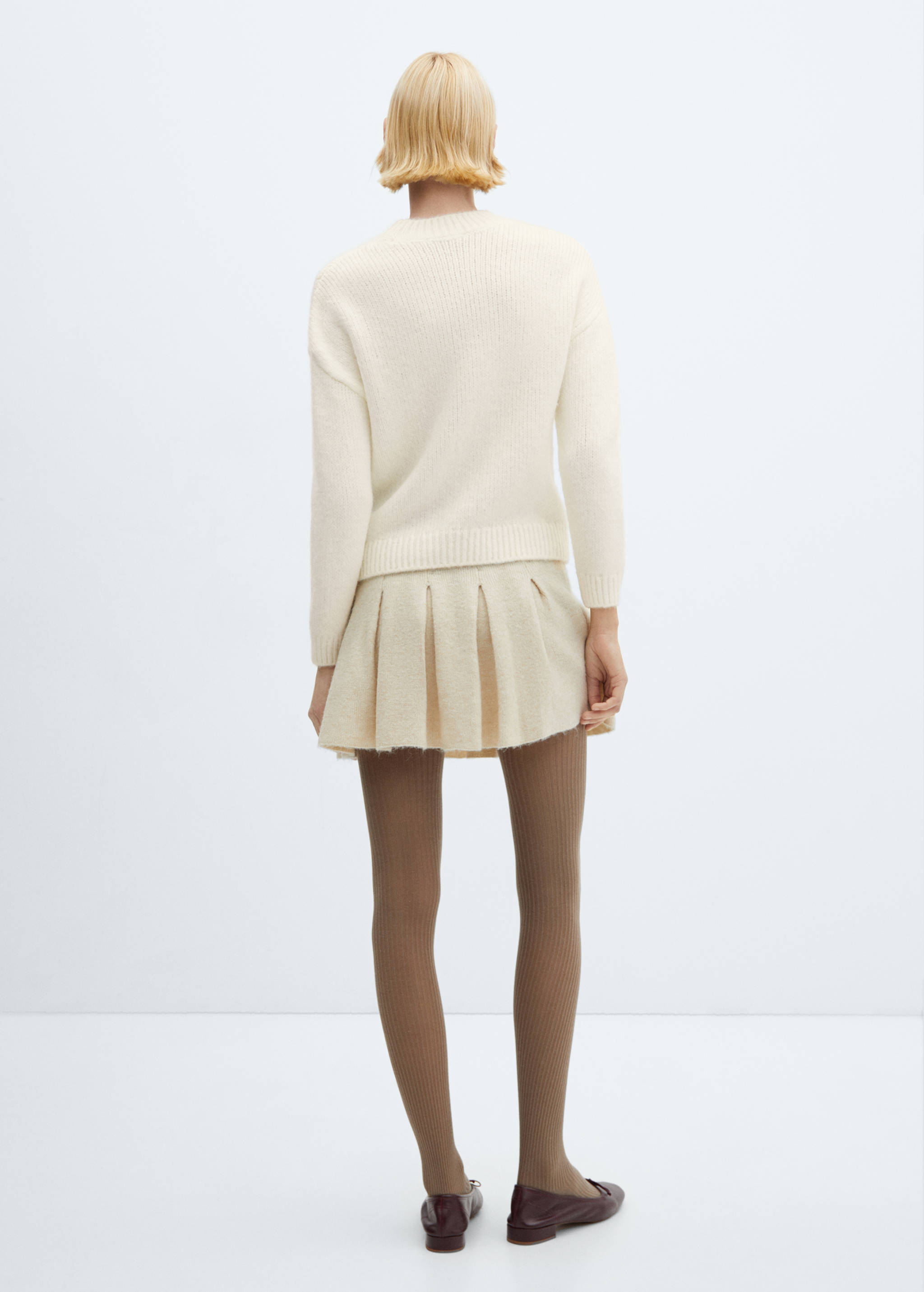 Round-neck knitted sweater - Reverse of the article