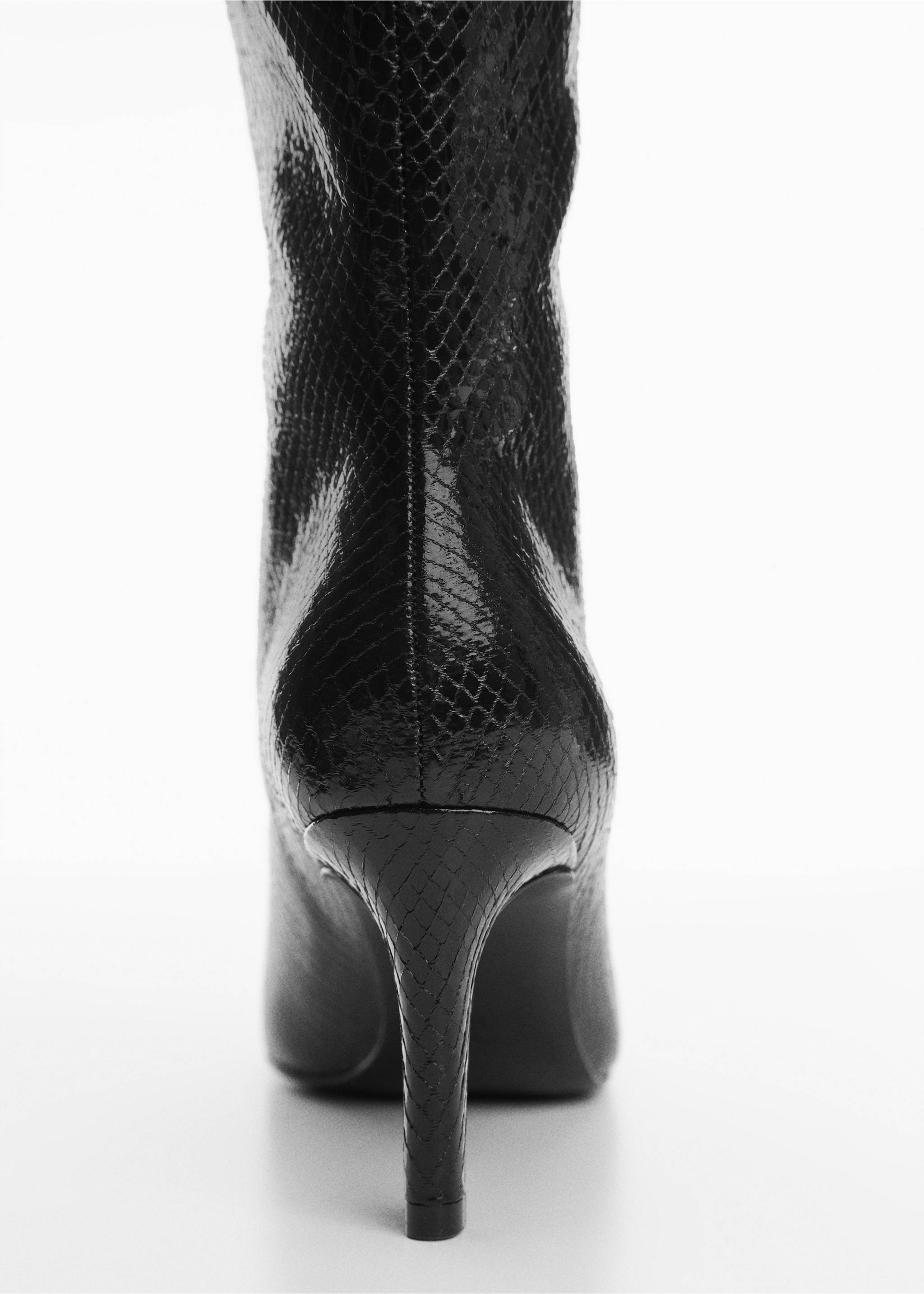 Heeled boots with animal print effect - Details of the article 1, Black. Ref: 67030255-00.