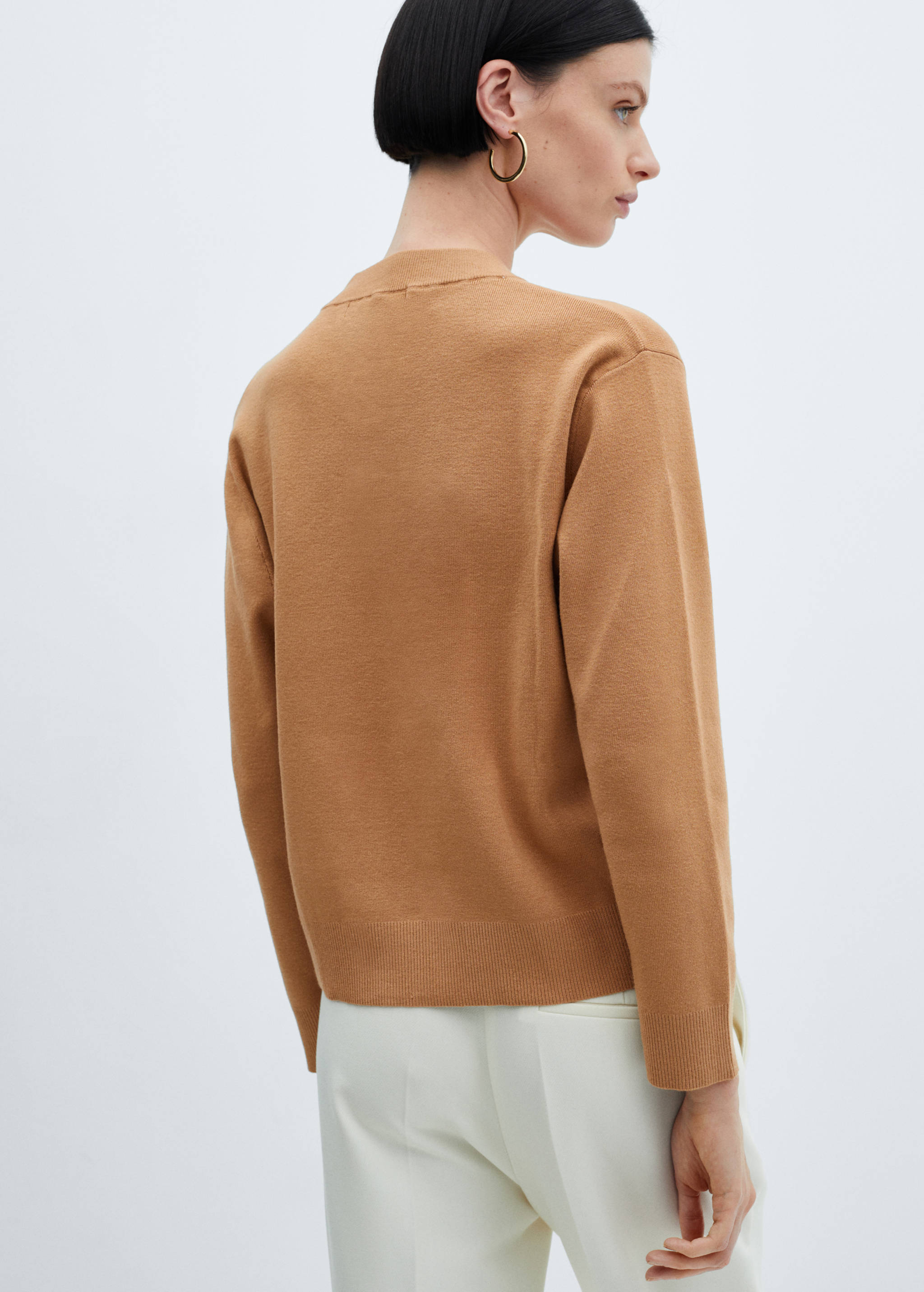 Round-neck knitted sweater - Reverse of the article
