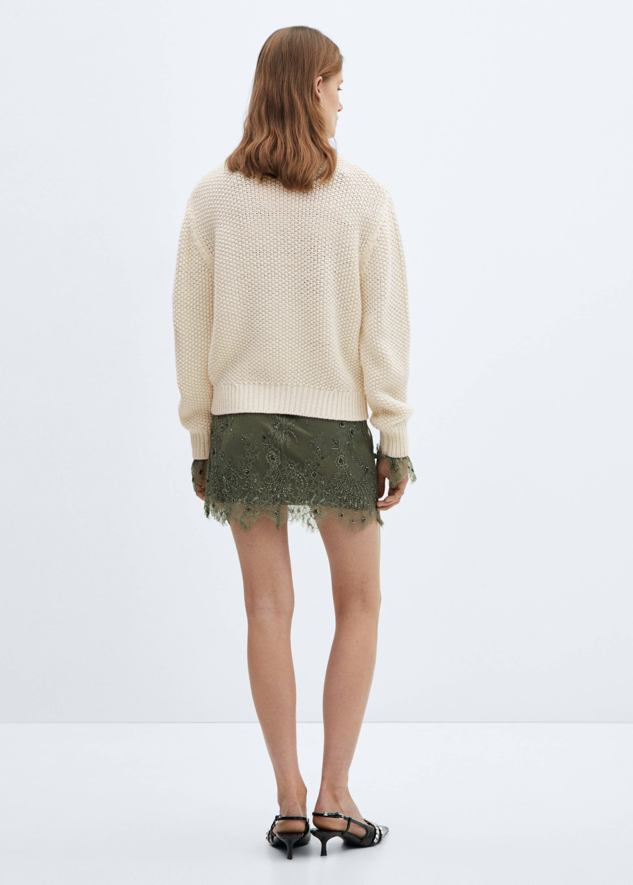 Round-neck knitted sweater - Reverse of the article