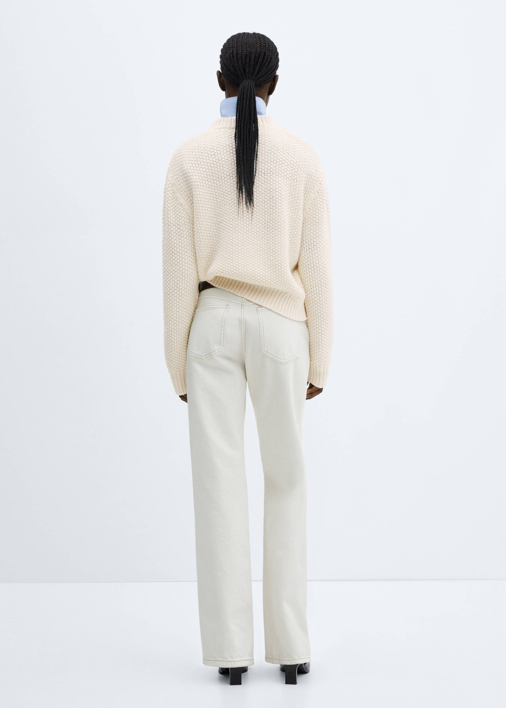 Round-neck knitted sweater - Reverse of the article