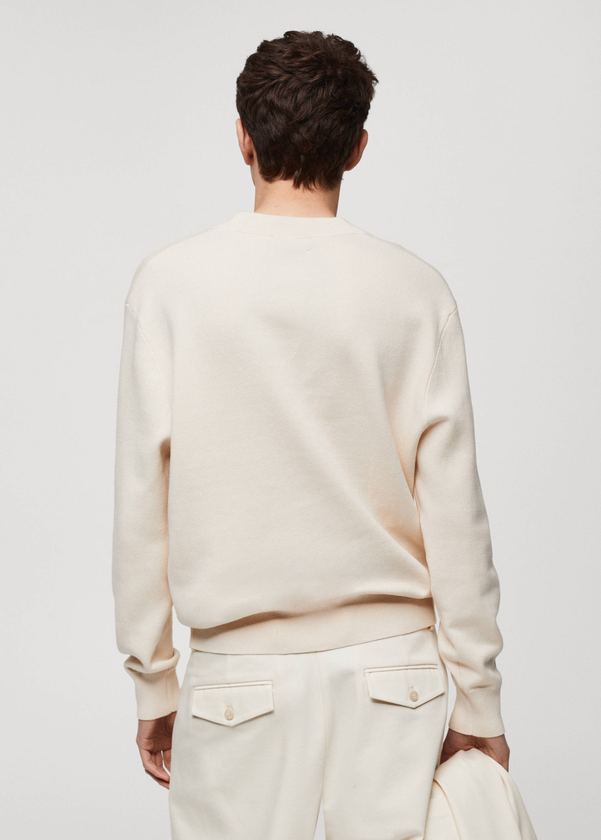 V-neck knit sweater - Reverse of the article