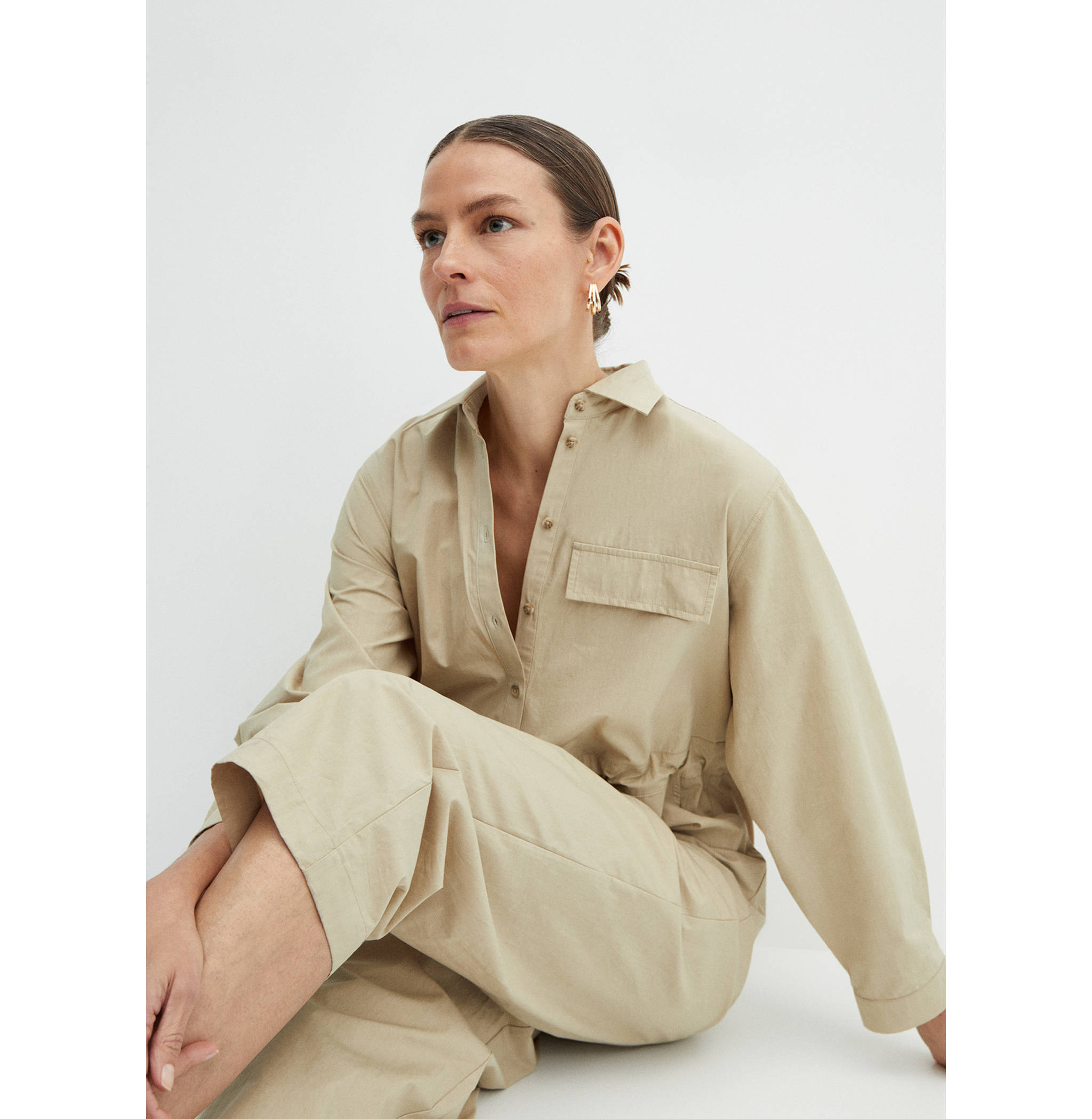 Buttoned long jumpsuit - Details of the article 1