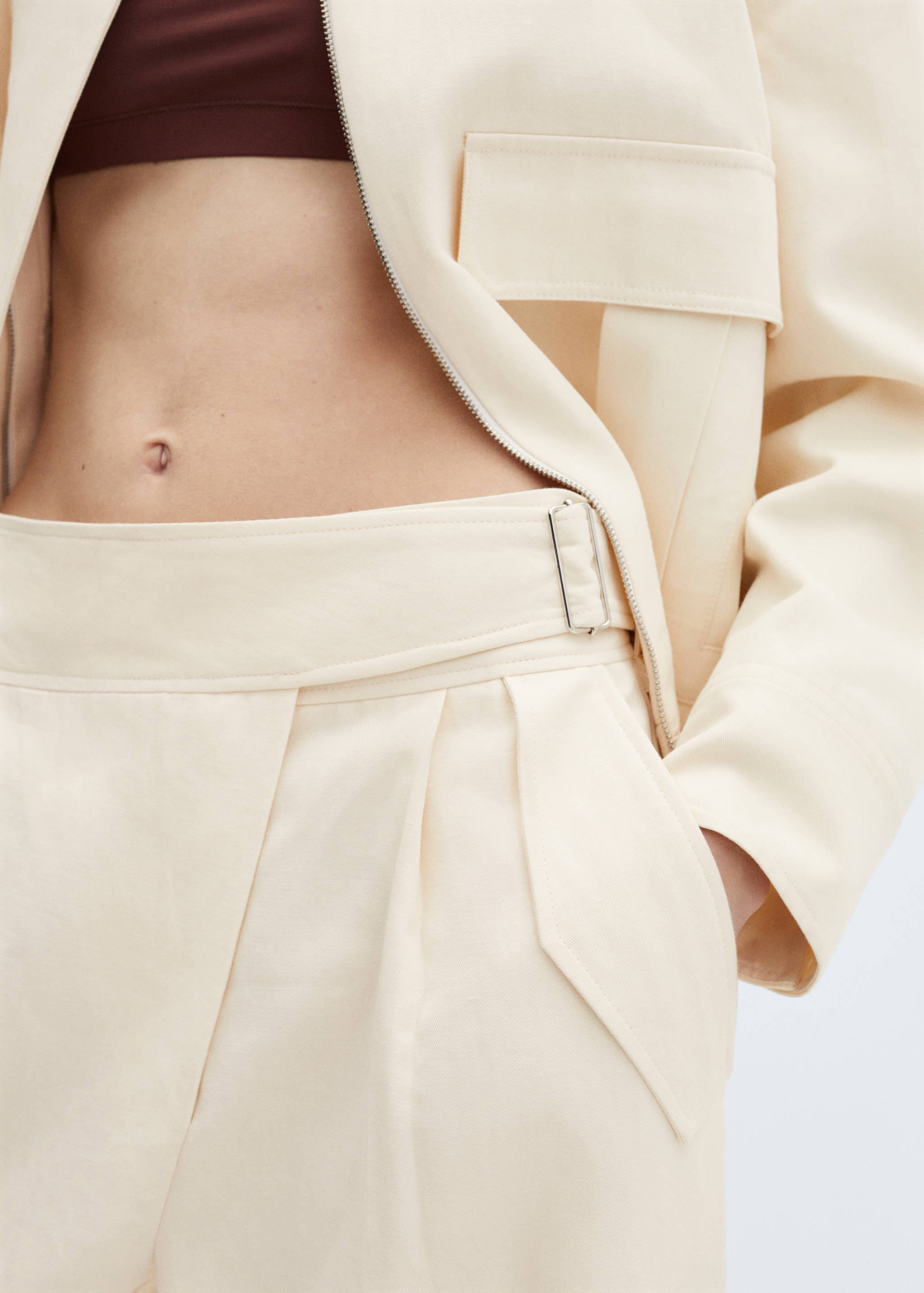 Crossed pleated trousers - Details of the article 6