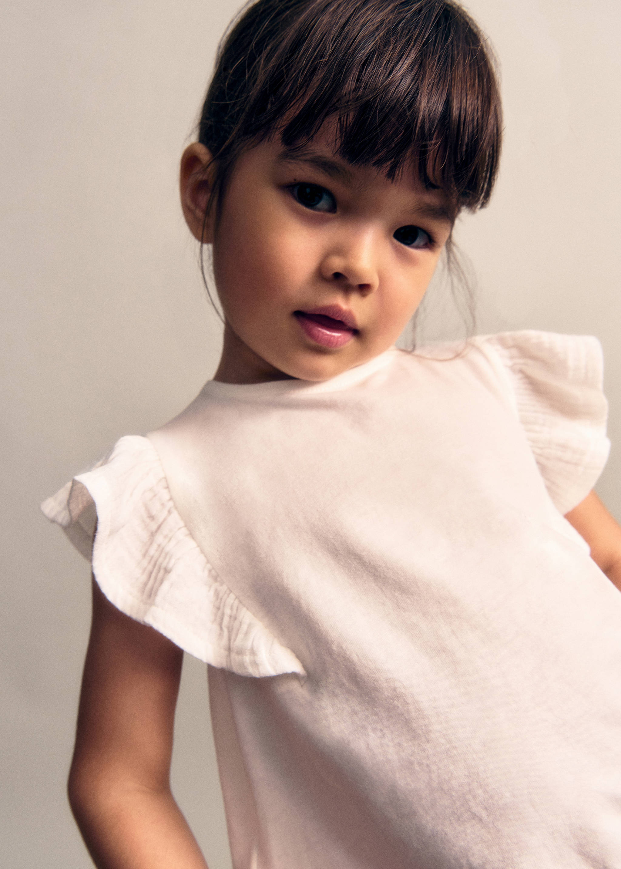 Kurzärmliges T-Shirt mit Rüschen - Detail des Artikels 6