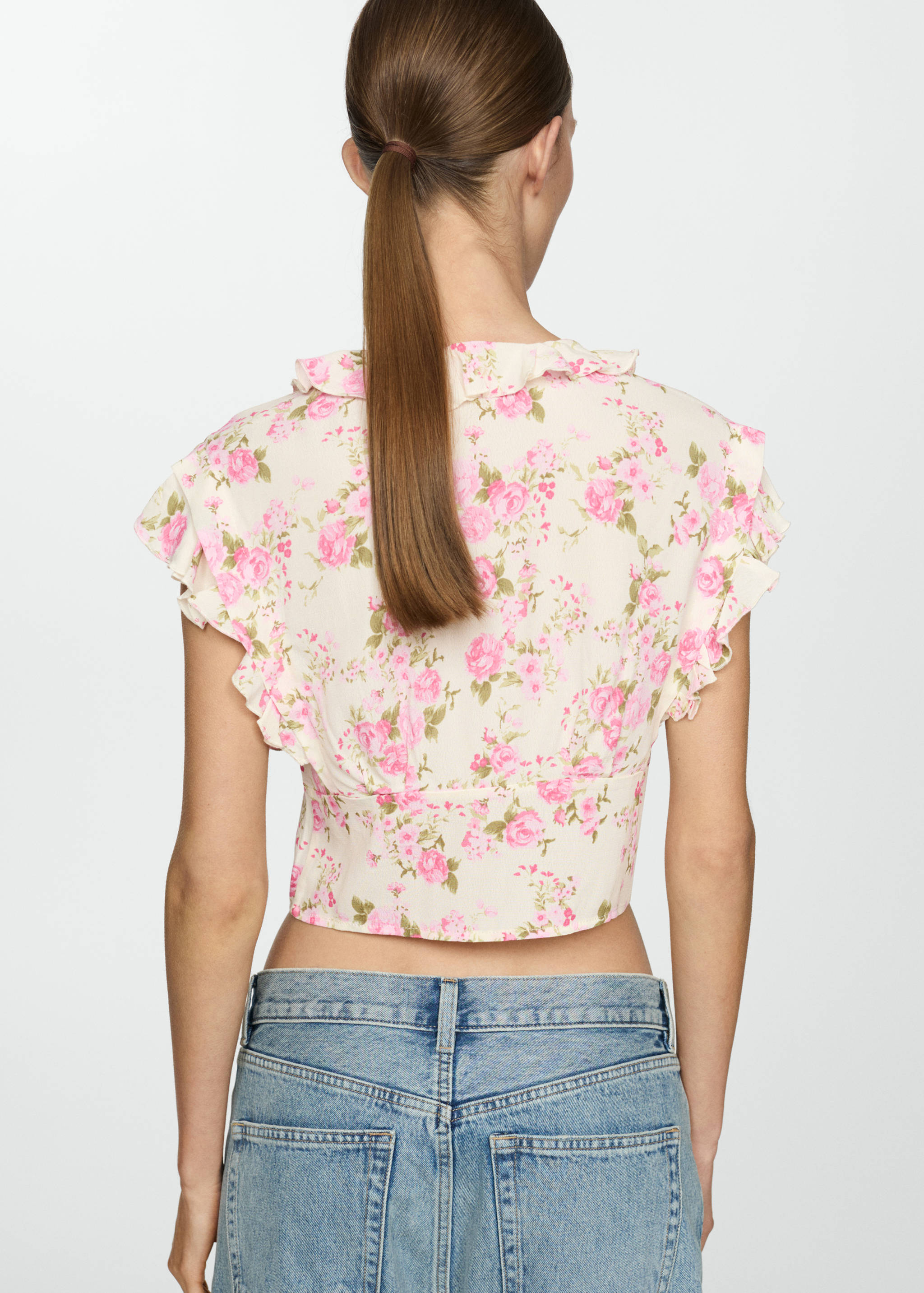 Floral blouse with bow closure - Reverse of the article