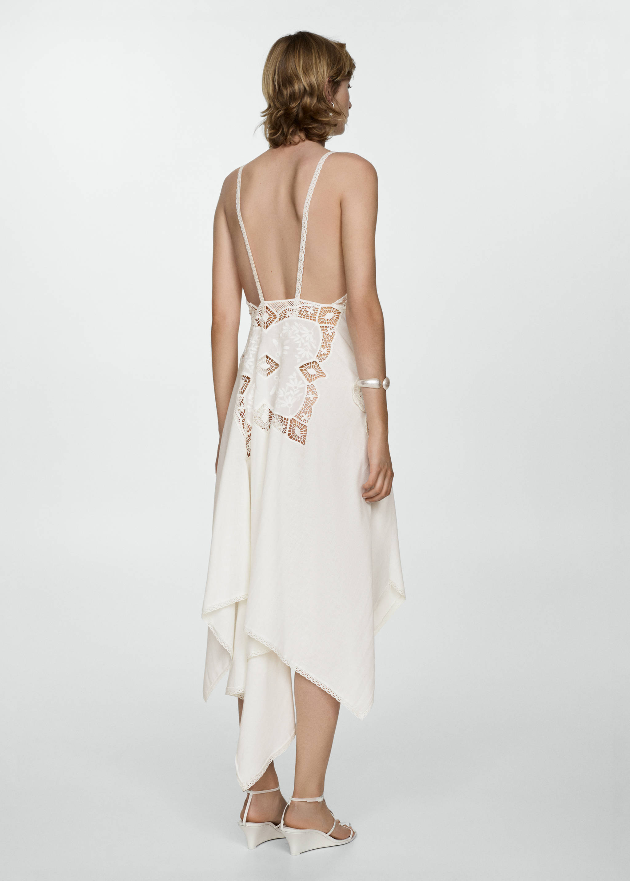 Asymmetrical dress with embroidered panels - Reverse of the article