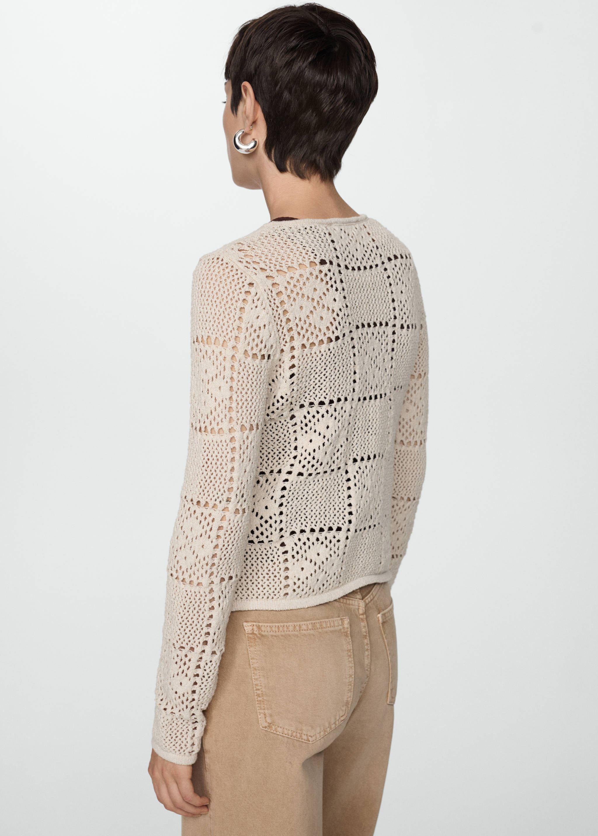 Crochet sweater with lace accents - Reverse of the article