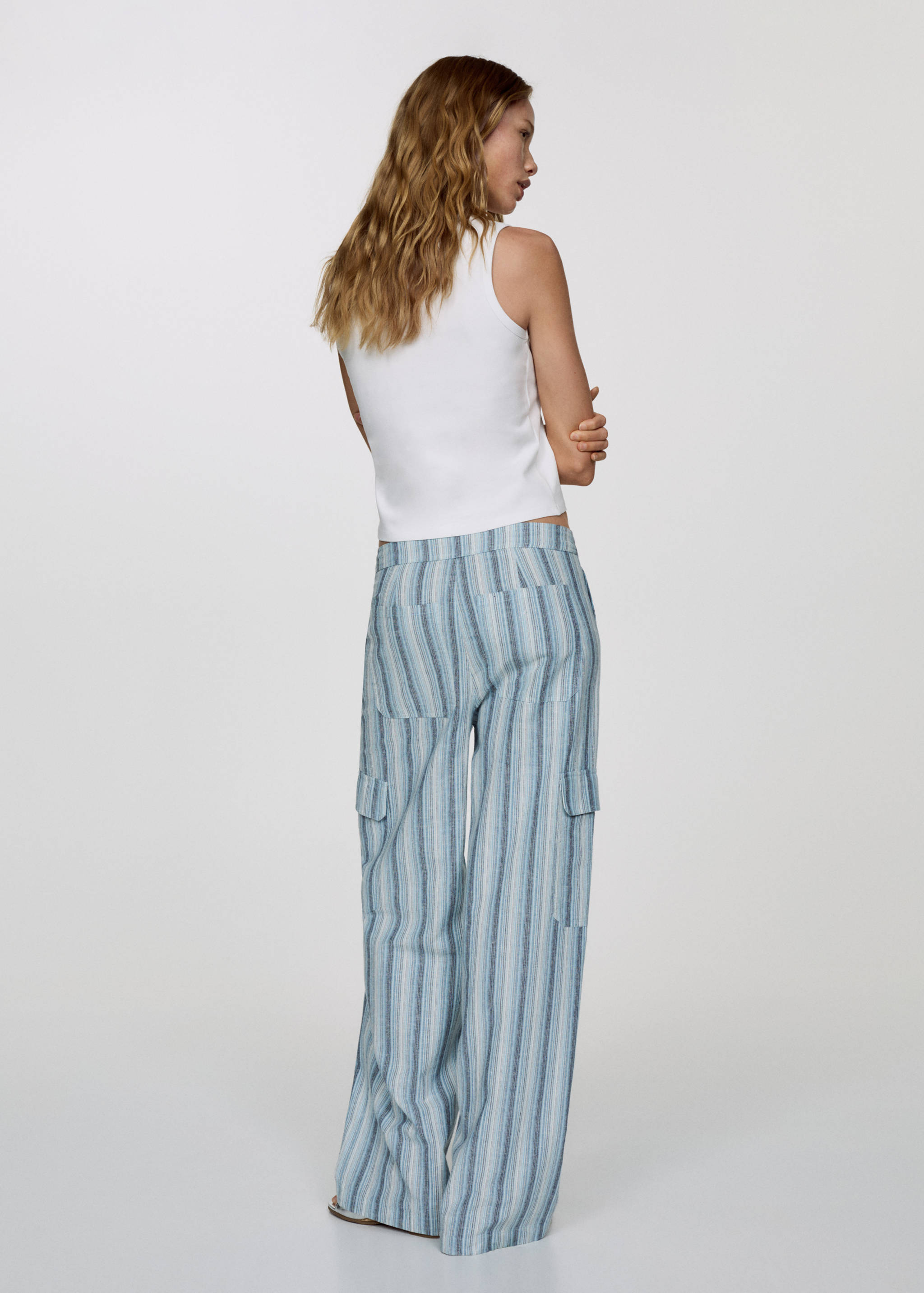 Striped trousers with cargo pockets - Reverse of the article
