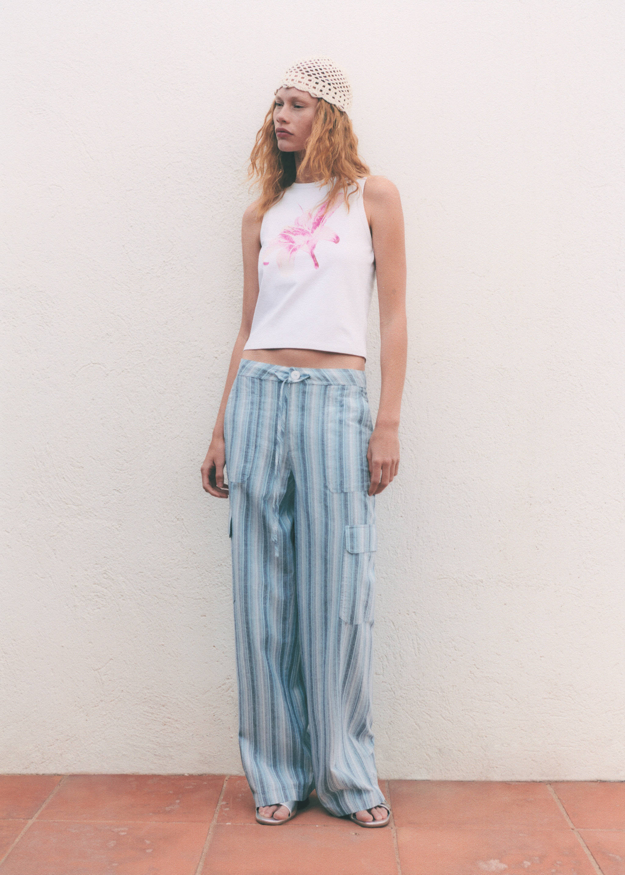 Striped trousers with cargo pockets - Details of the article 6