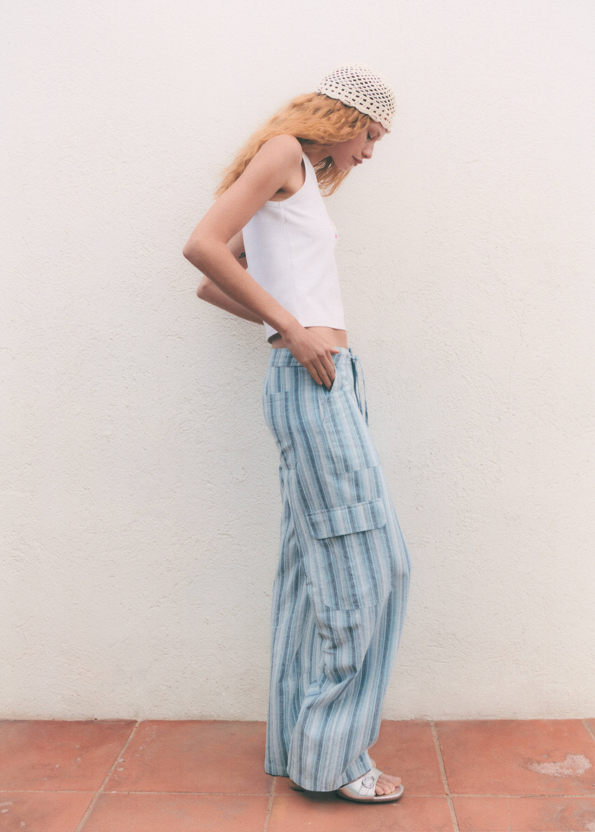 Striped trousers with cargo pockets - Details of the article 7
