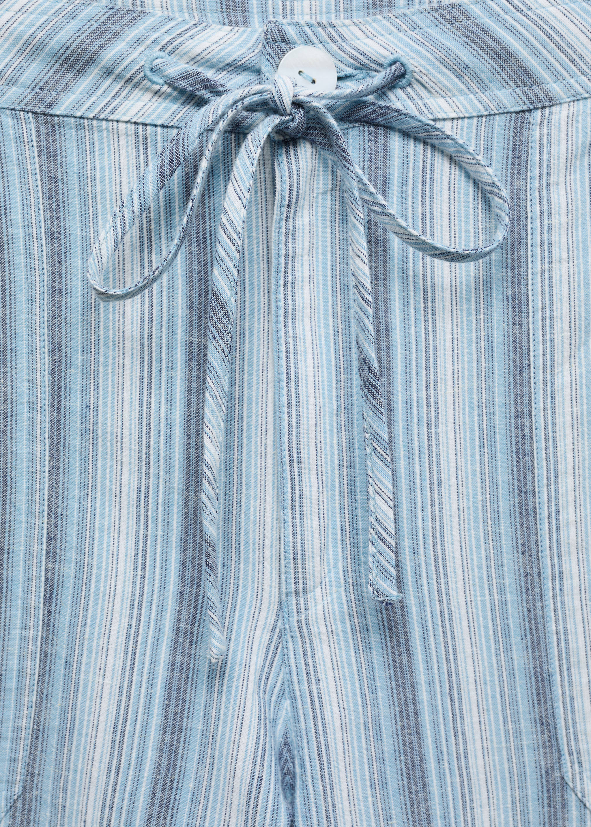 Striped trousers with cargo pockets - Details of the article 8