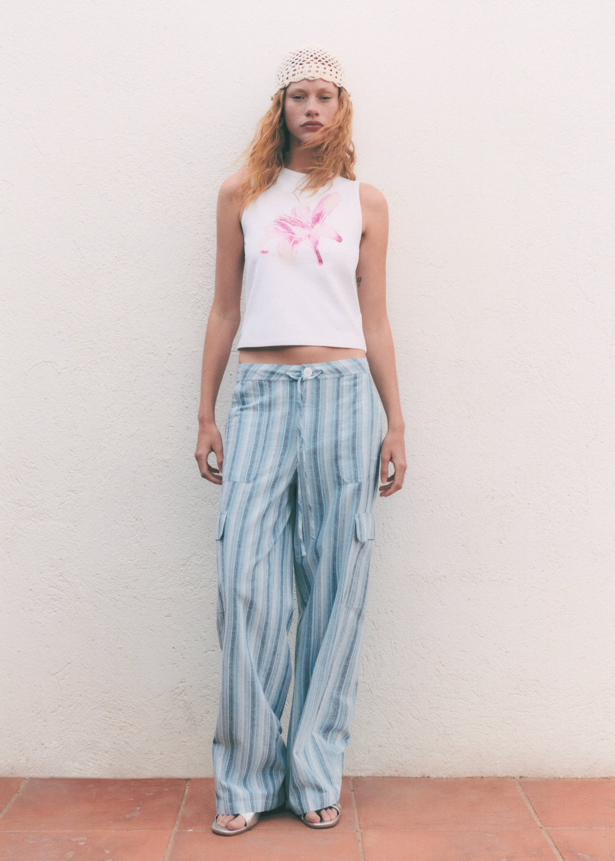 Striped trousers with cargo pockets - Details of the article 9