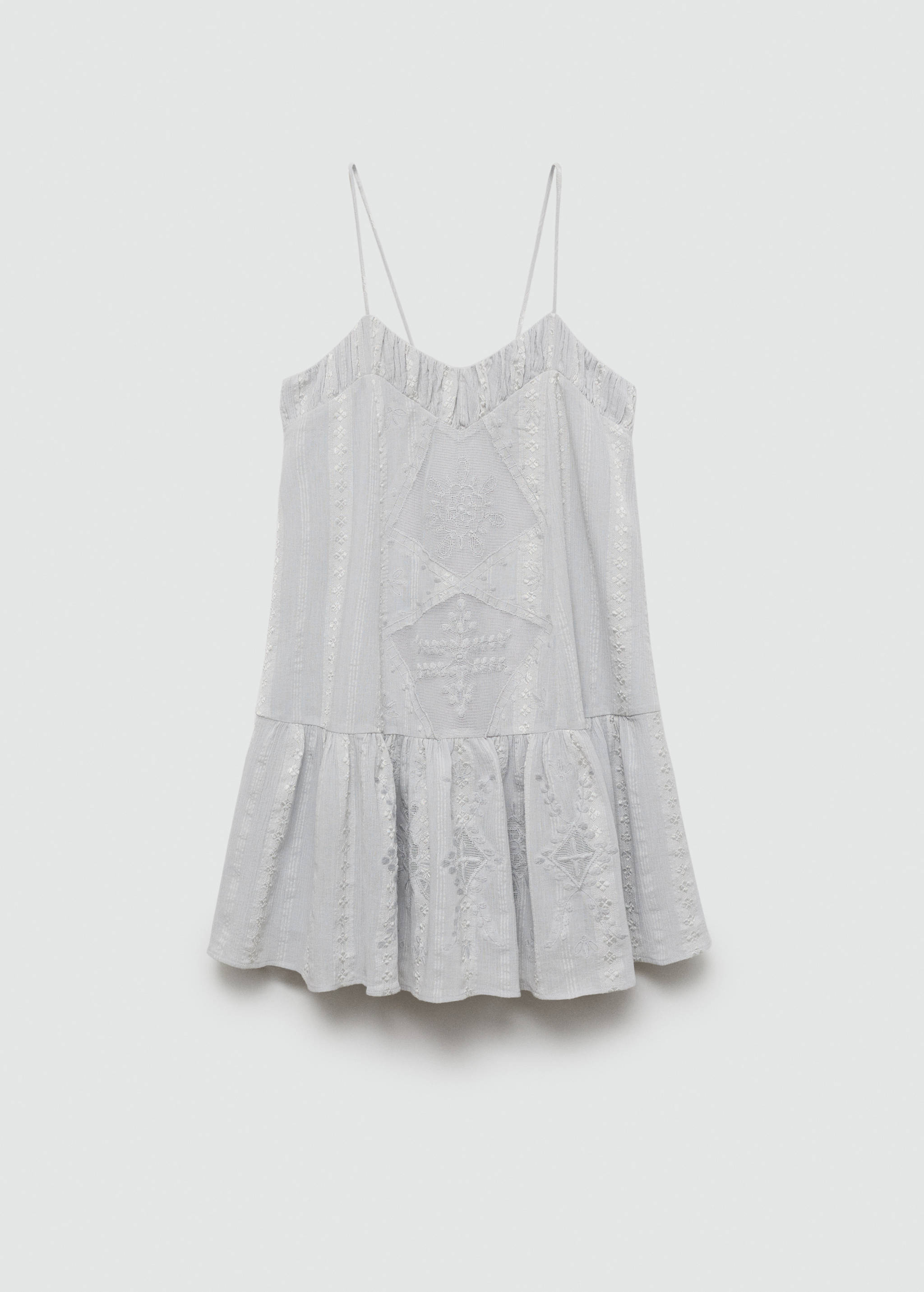 Robe brodée détail pompons - Article sans modèle