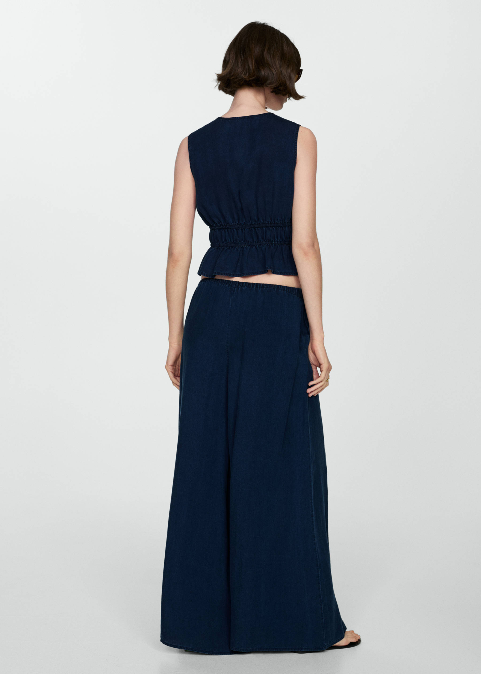 Lyocell trousers with elastic waistband - Reverse of the article
