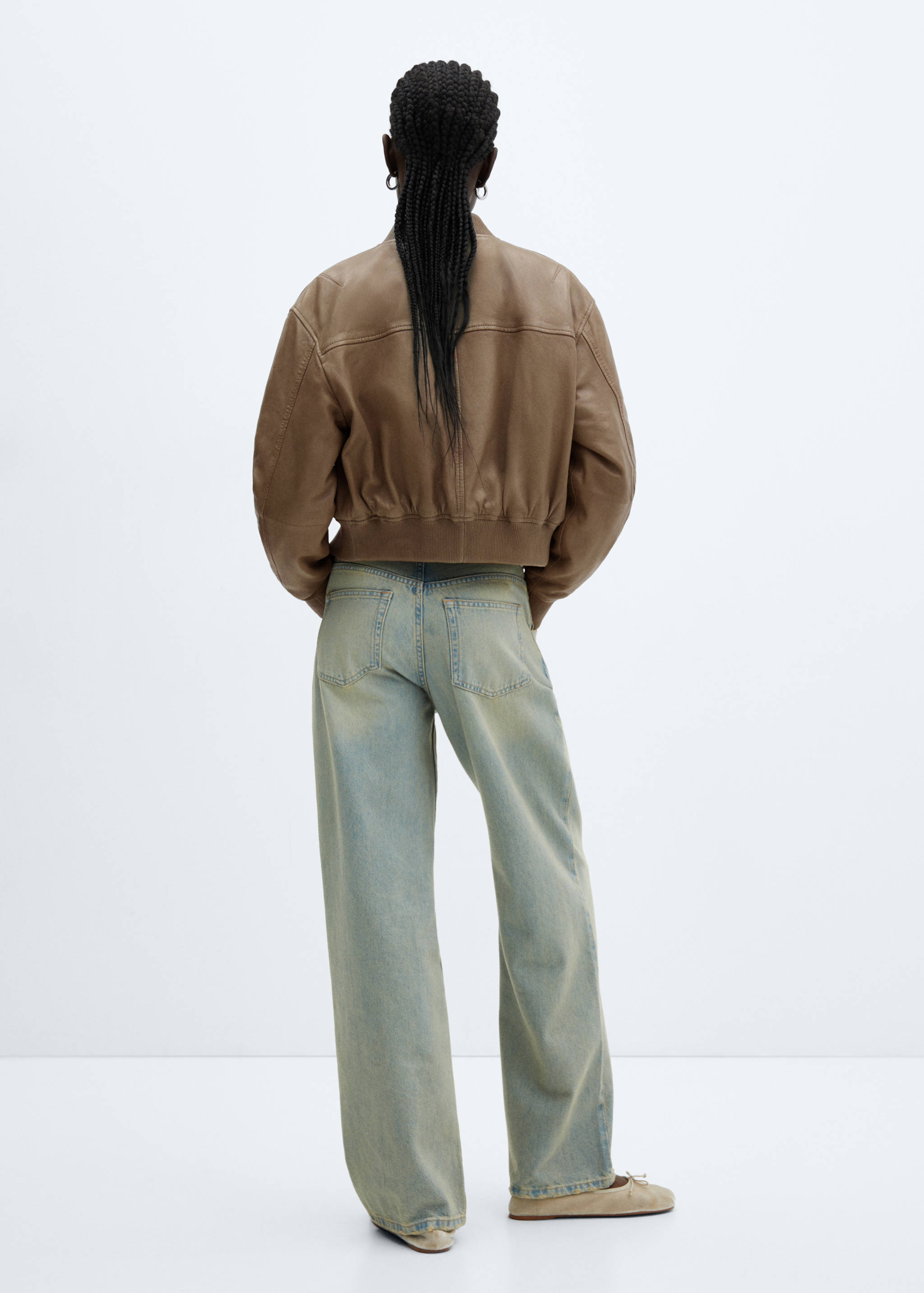 Leren bomberjack - Achterkant van het artikel