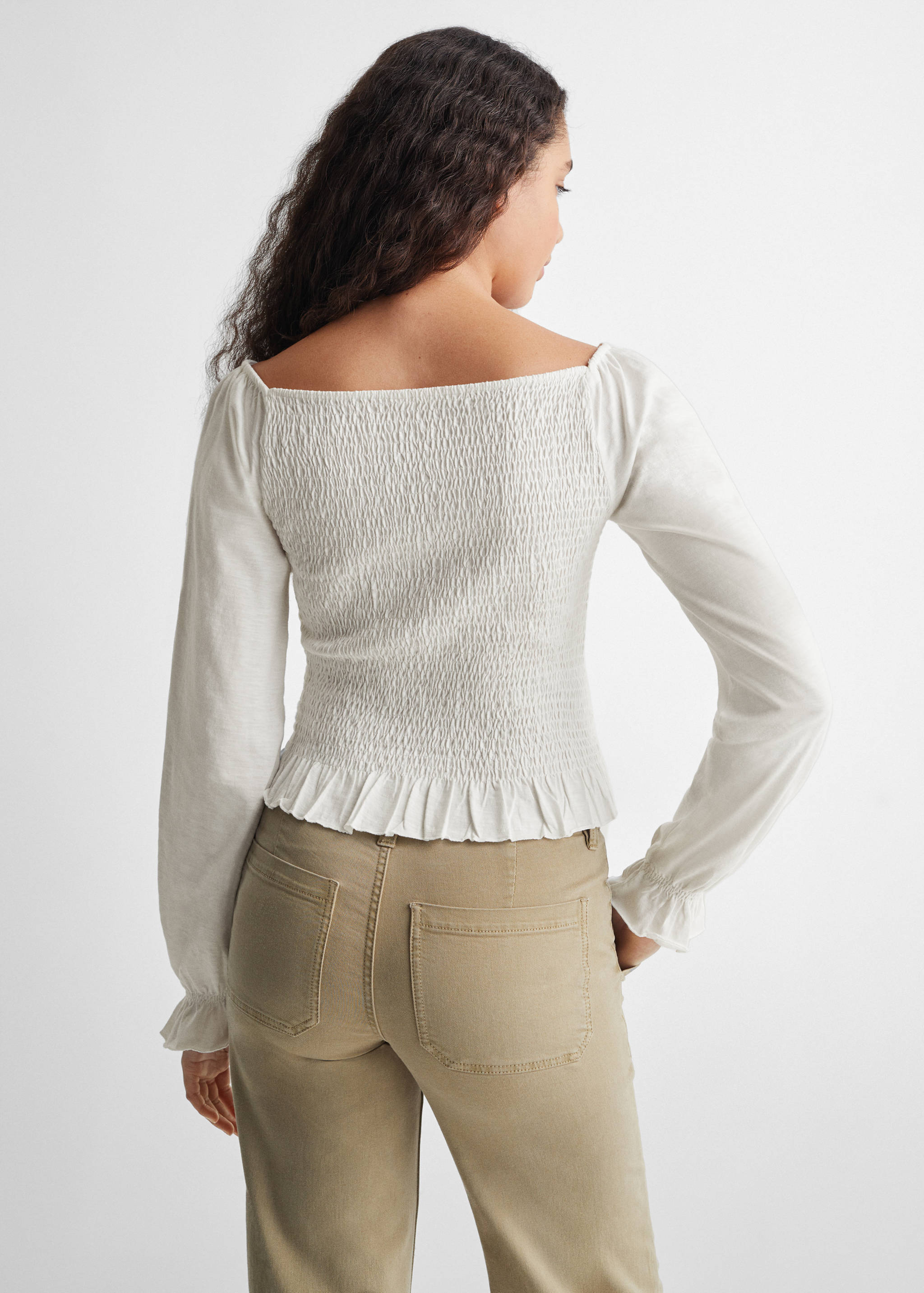 Long-sleeved t-shirt with ruffles - Reverse of the article