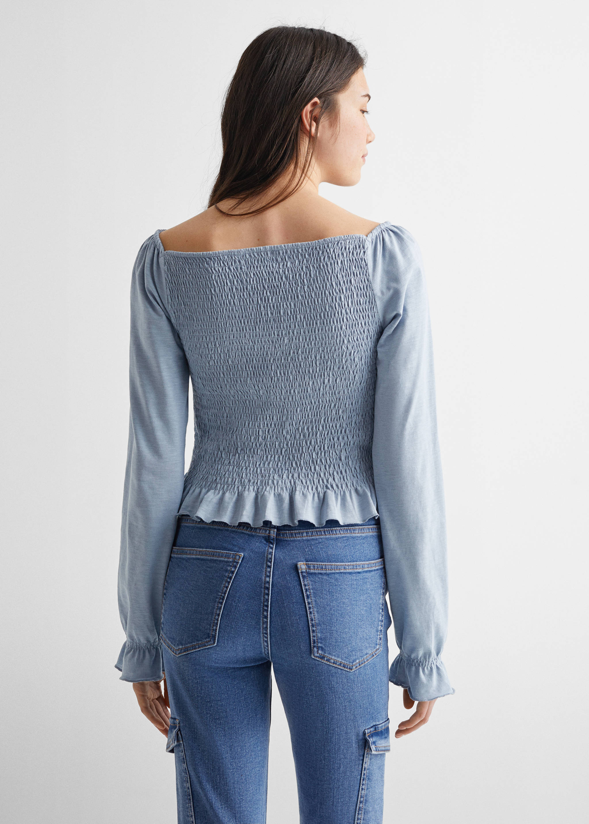 Long-sleeved t-shirt with ruffles - Reverse of the article