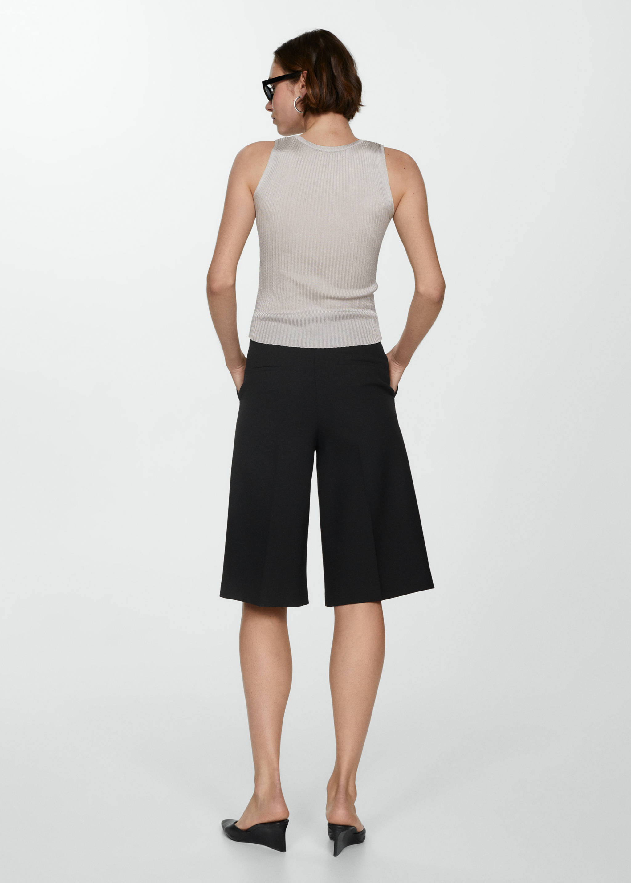 Knitted top with metallic thread - Reverse of the article