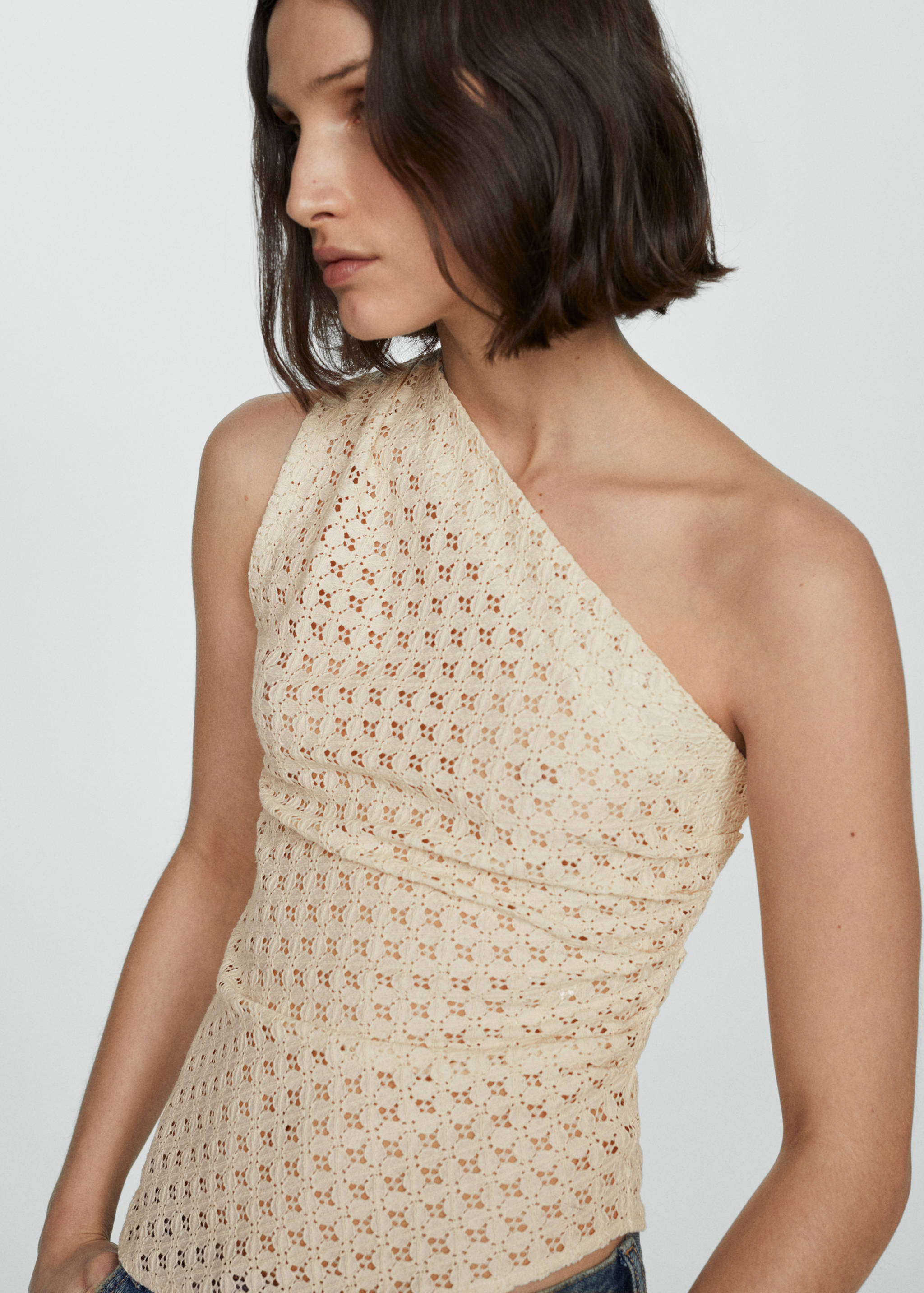 قمة مخرمة غير متناظرة - تفاصيل المنتج 1