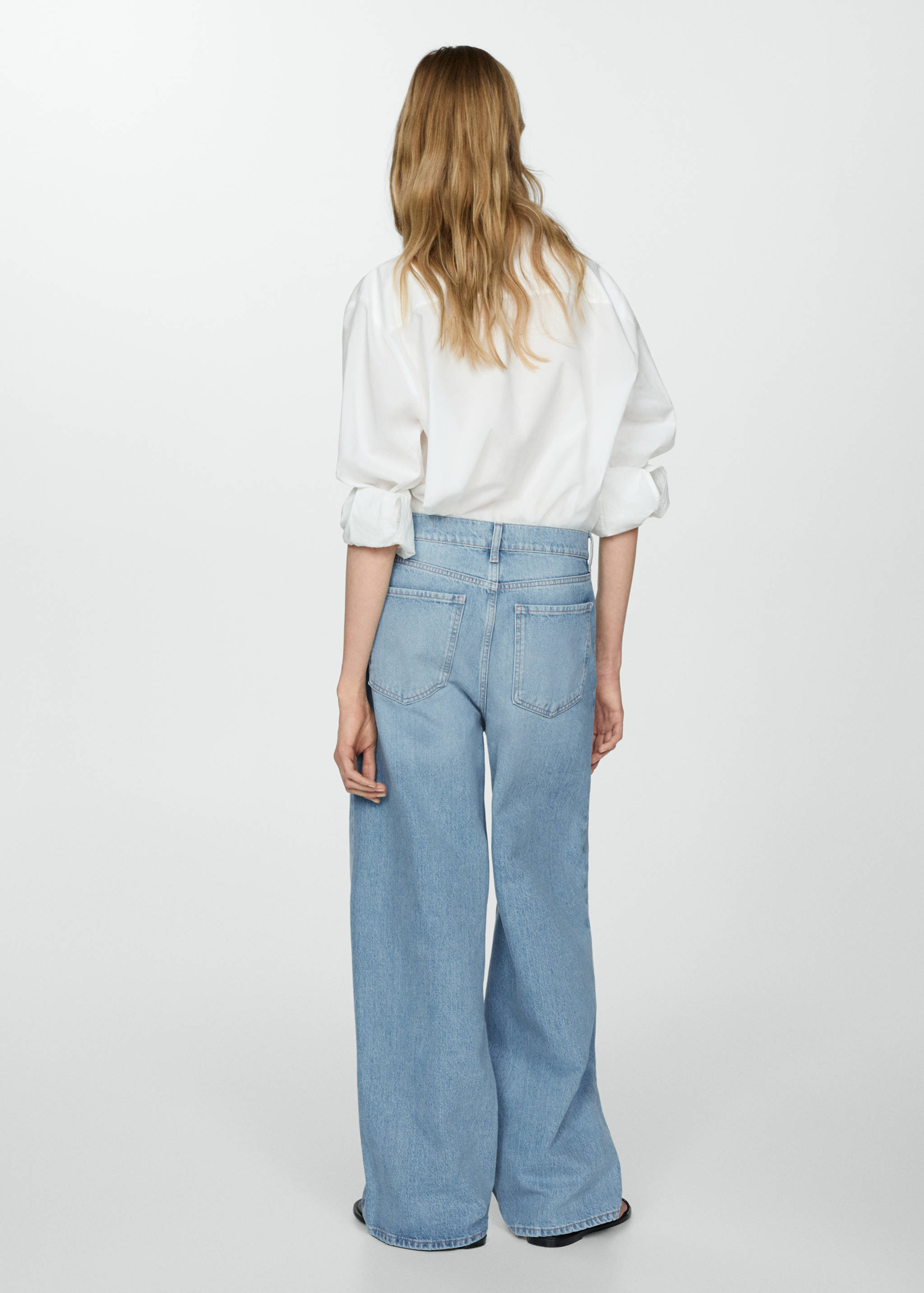 Low-rise loose-fit wide leg jeans - Reverse of the article