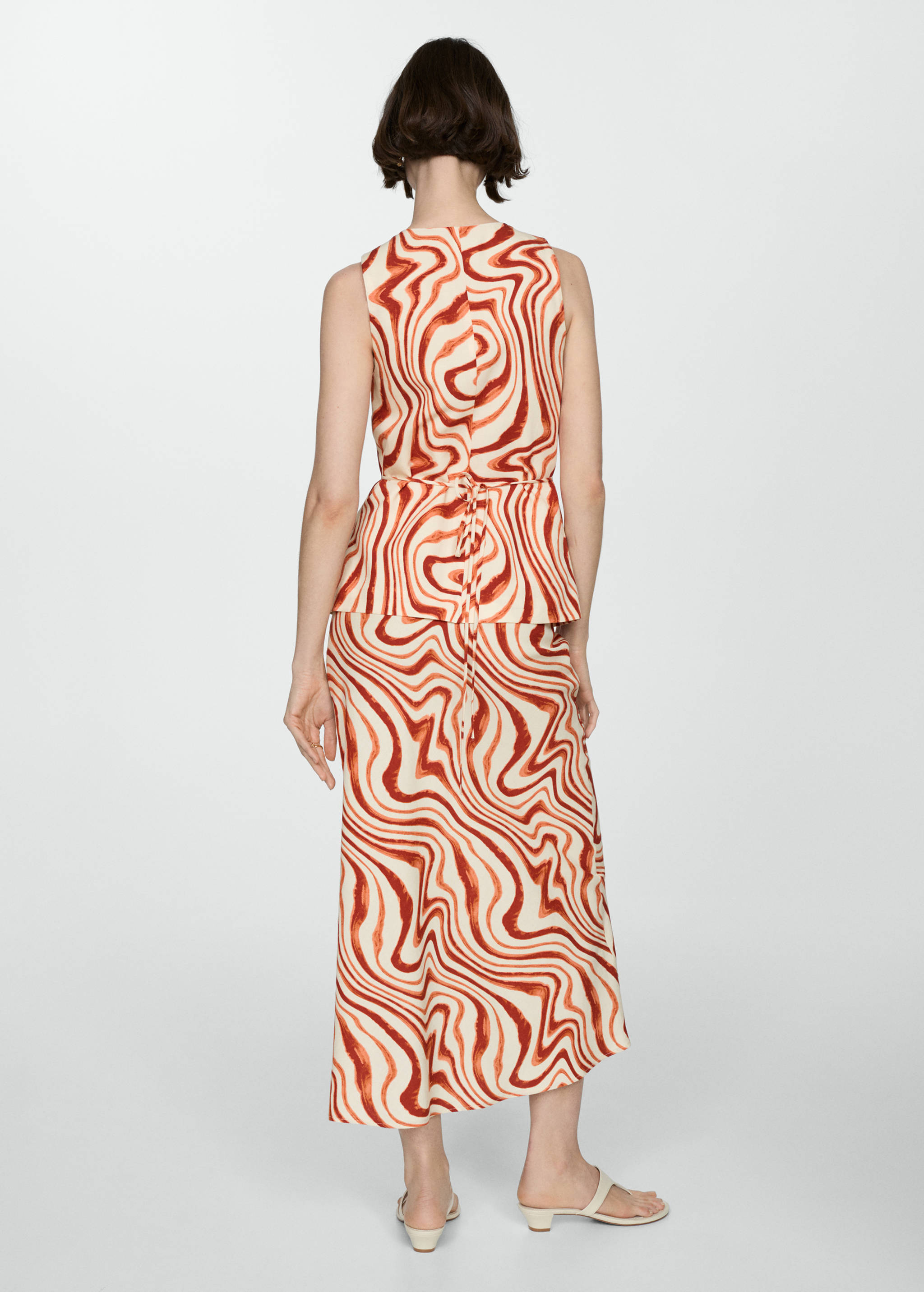 Bow print top - Reverse of the article