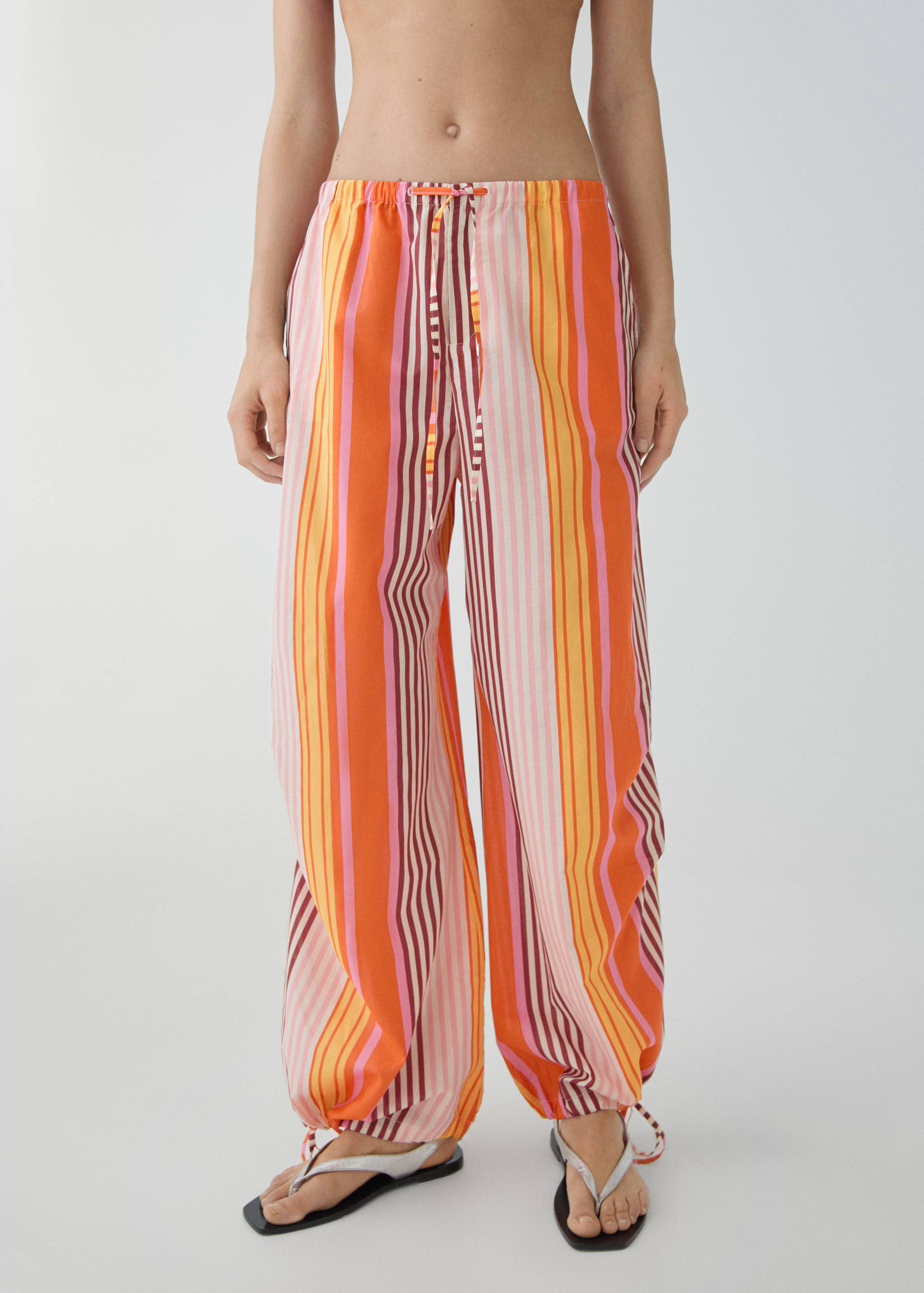 Parachute trousers with striped print - Medium plane