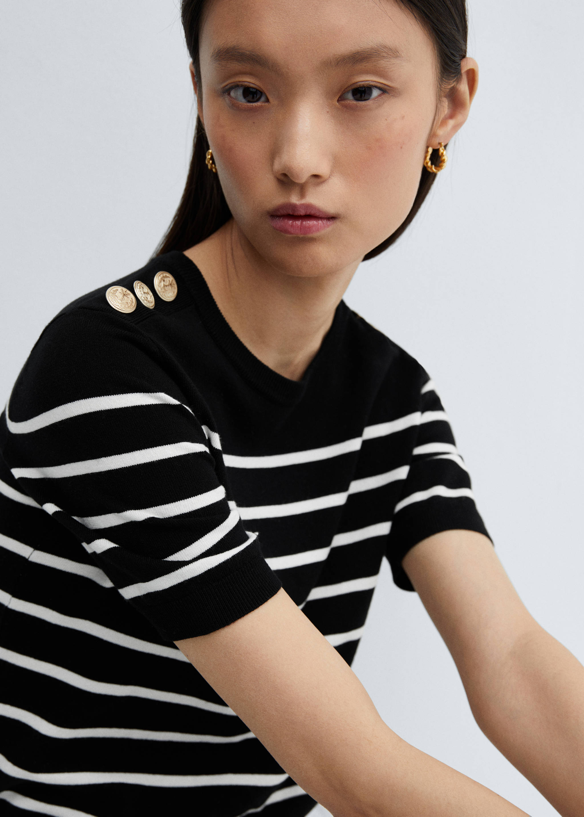 Buttoned striped sweater - Details of the article 1