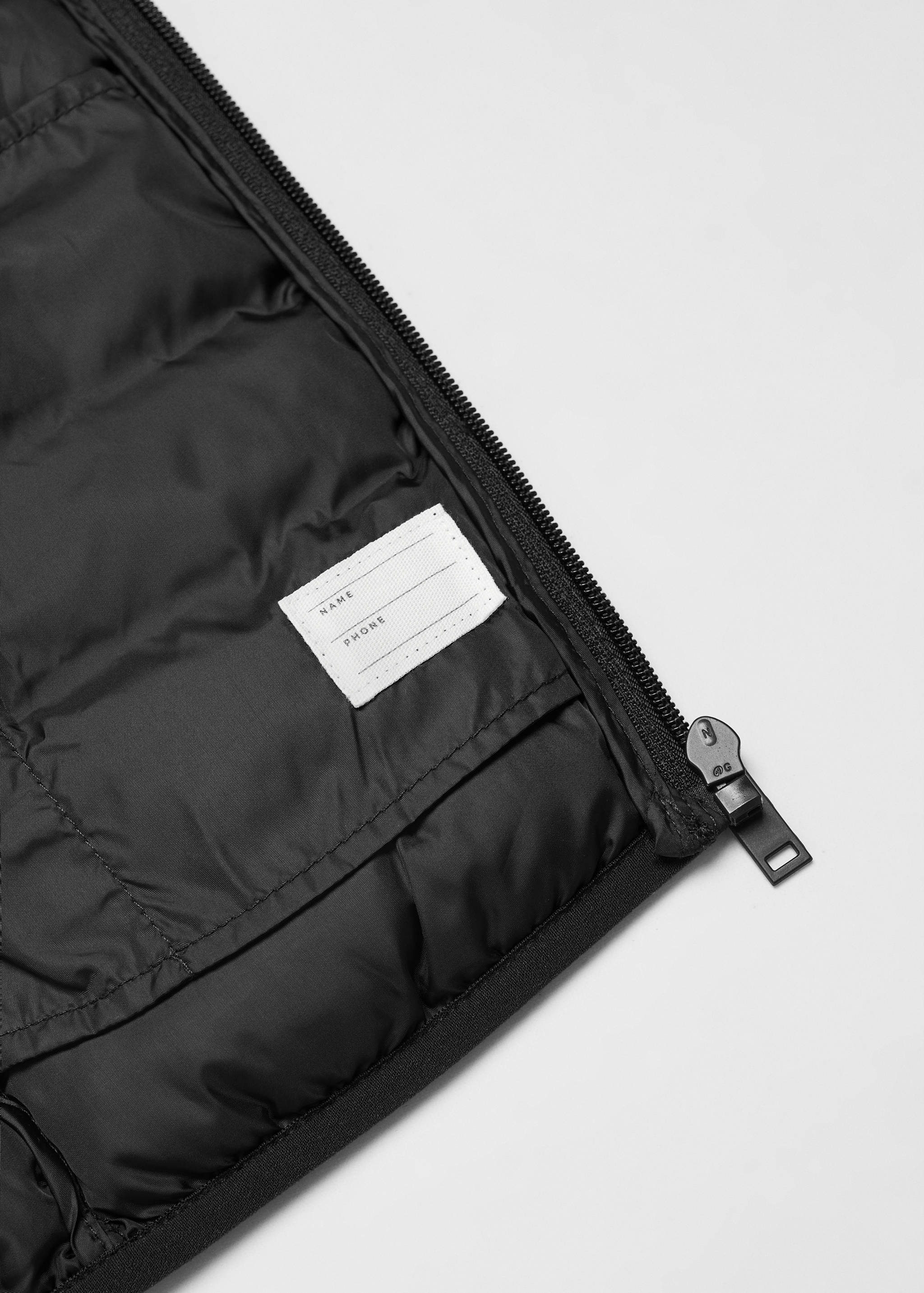 Colete acolchoado capuz - Pormenor do artigo 8