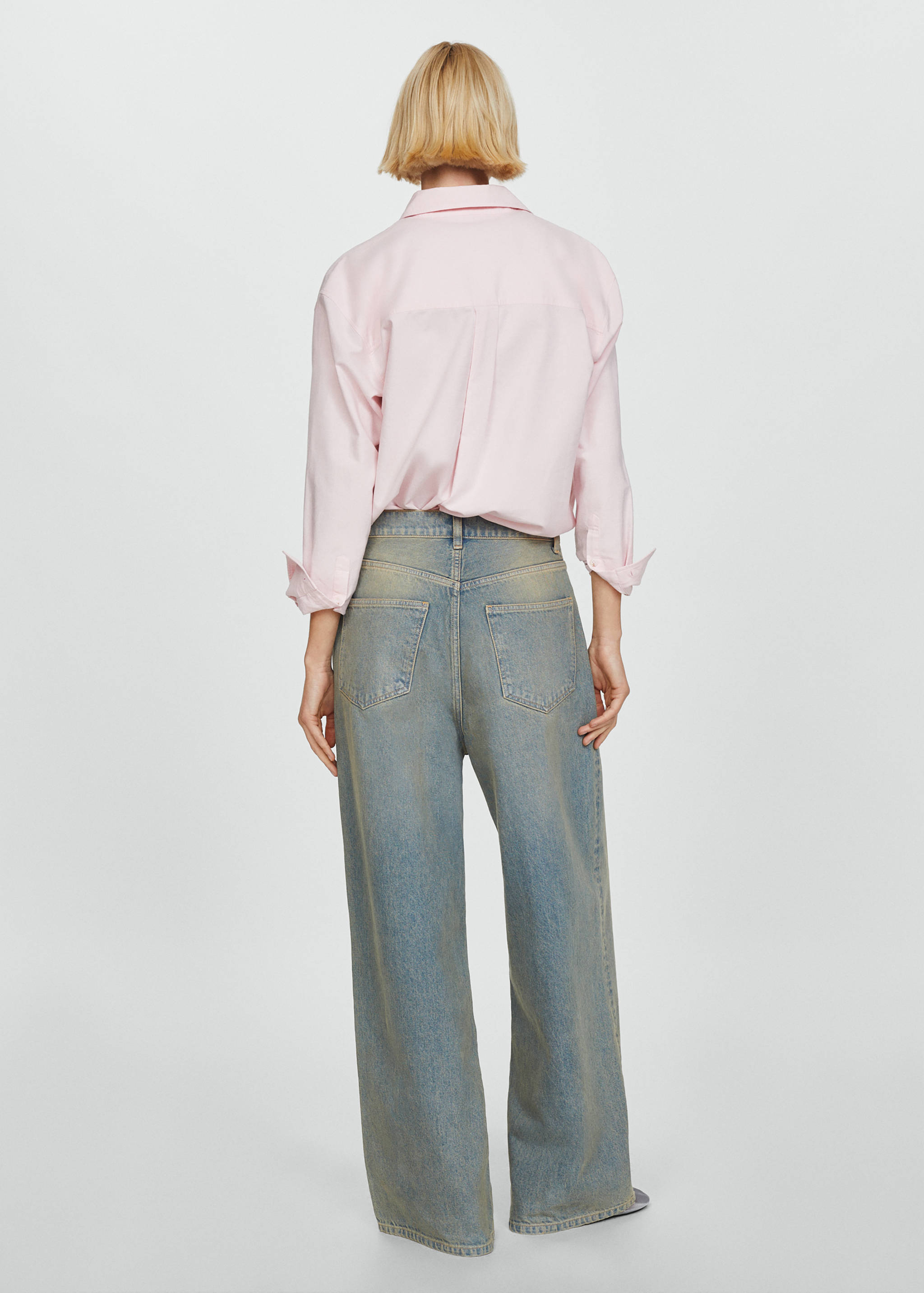 Low-rise loose-fit wide leg jeans - Reverse of the article